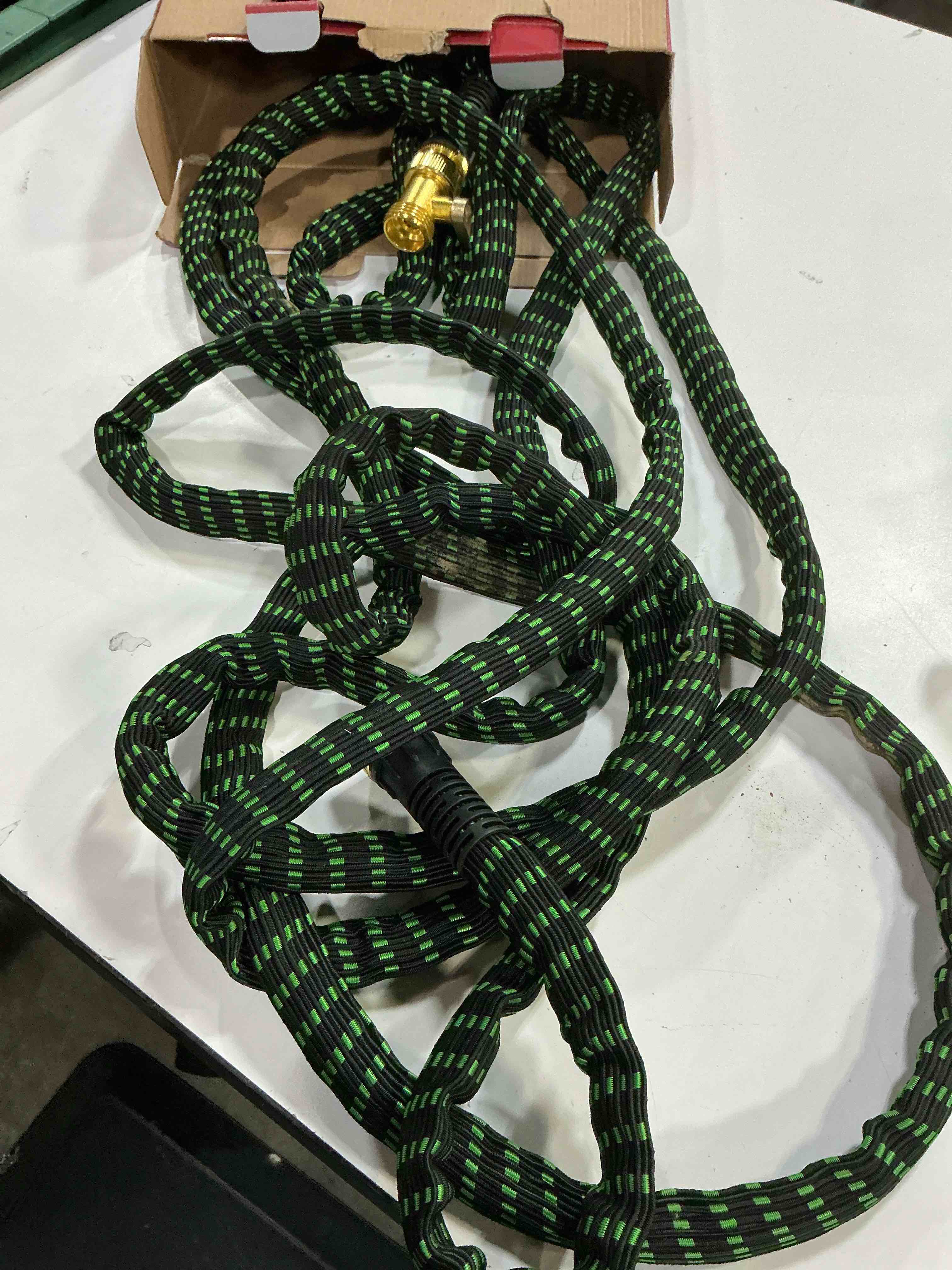 Condition photo showing As Is for rainpoint metal garden hose 25 ft - no-kink 304 steel water hose with 10 mode nozzle - brass connection, swivel handle, flexible hose,lightweight, puncture