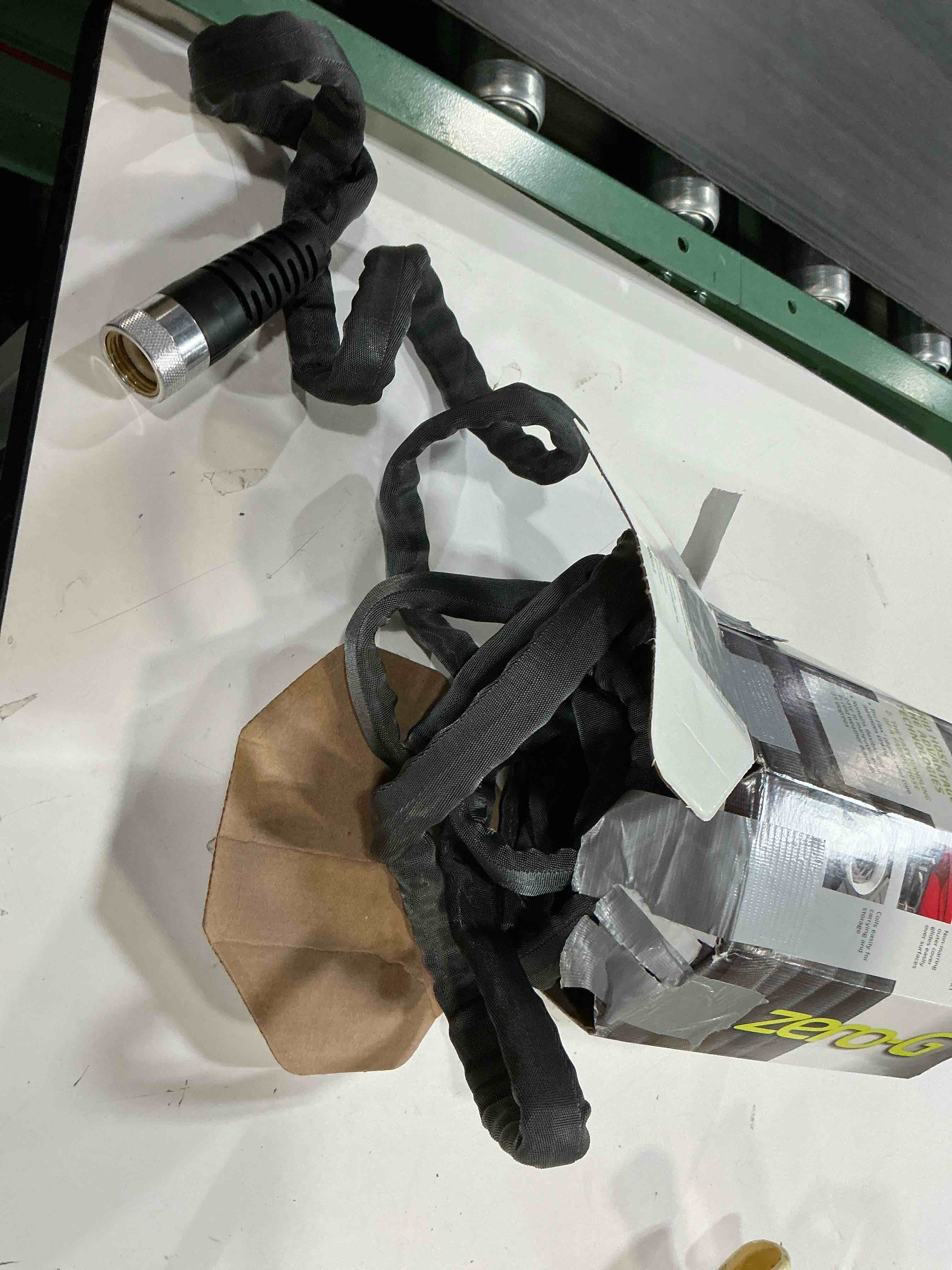 Condition photo showing As Is for zero-g teknor apex 5/8-in x 50-ft premium -duty kink free woven gray hose