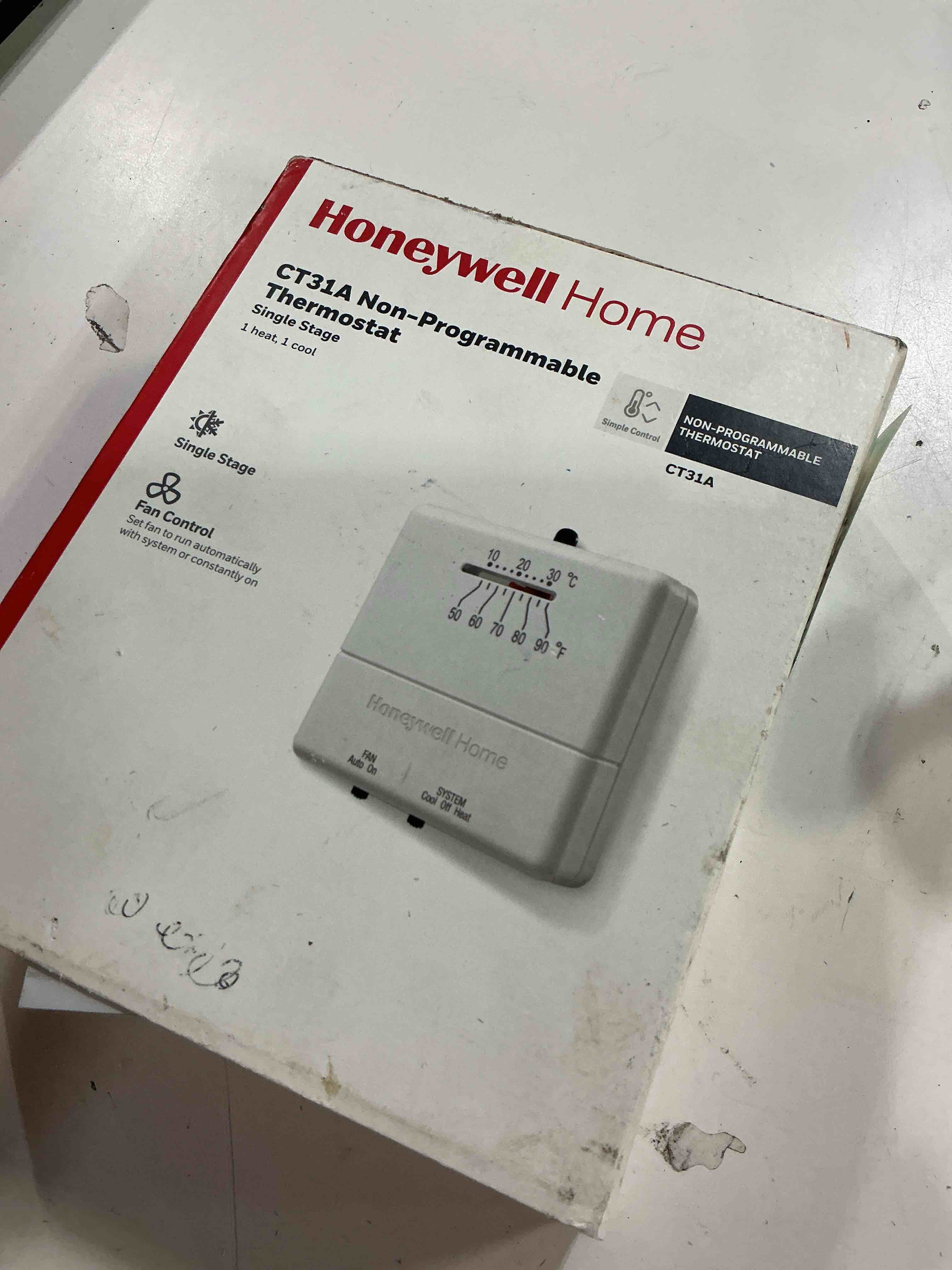 Condition photo showing As Is for honeywell home ct31a1003 heat/cool non-programmable thermostat, beige (pack of 1)