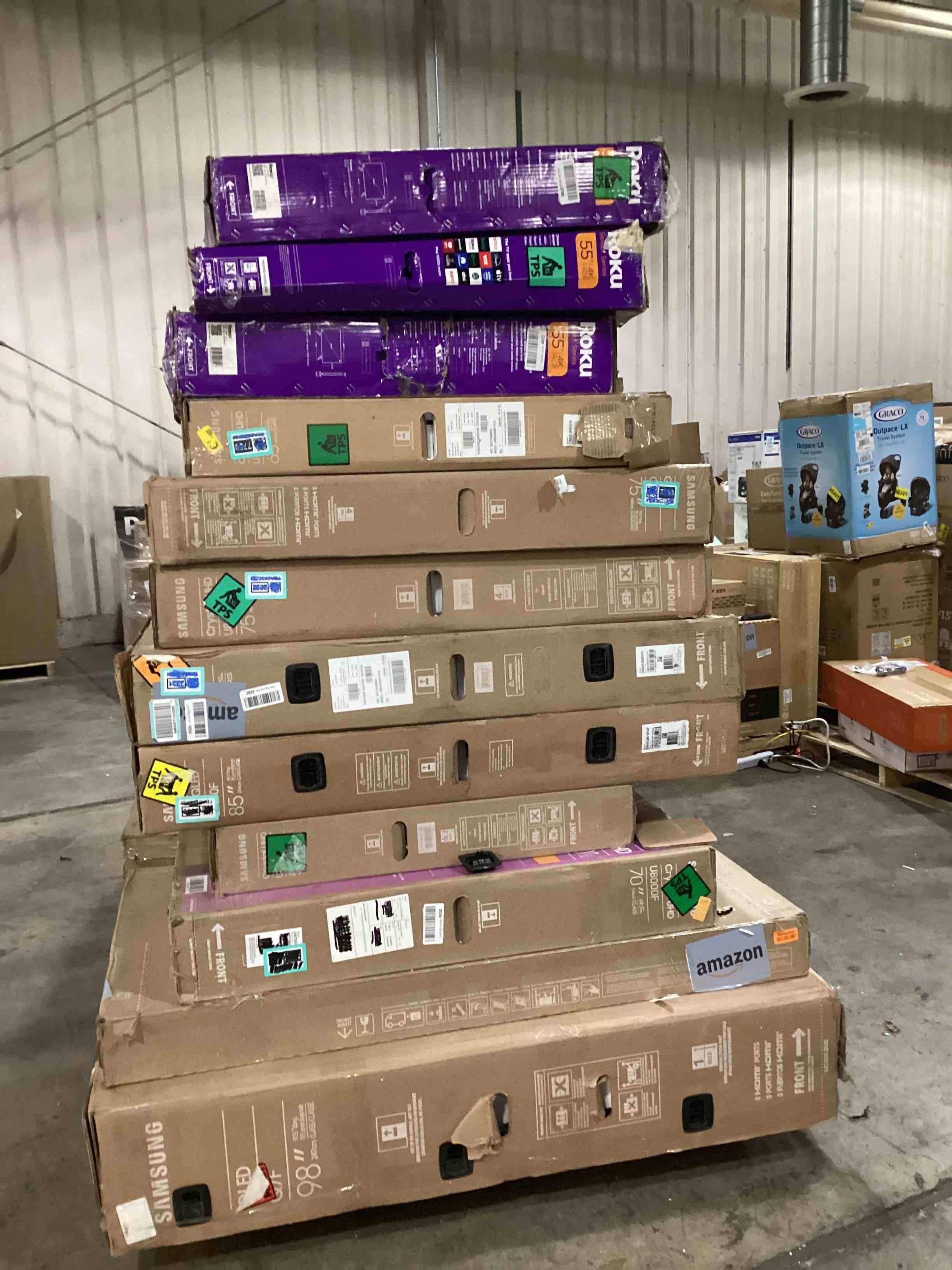 pallet of defective electronics for parts