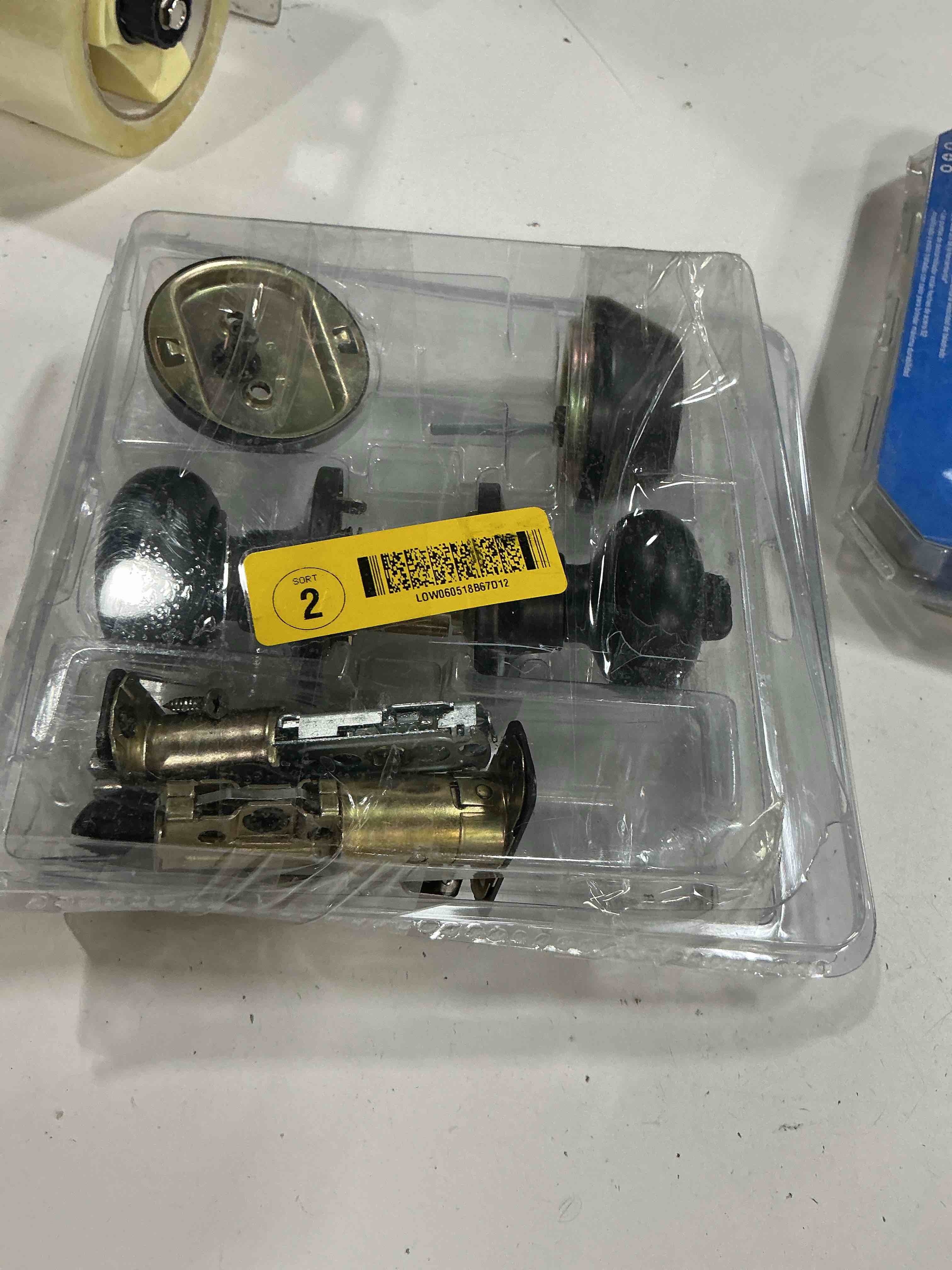 Condition photo showing As Is for door knob with lock
