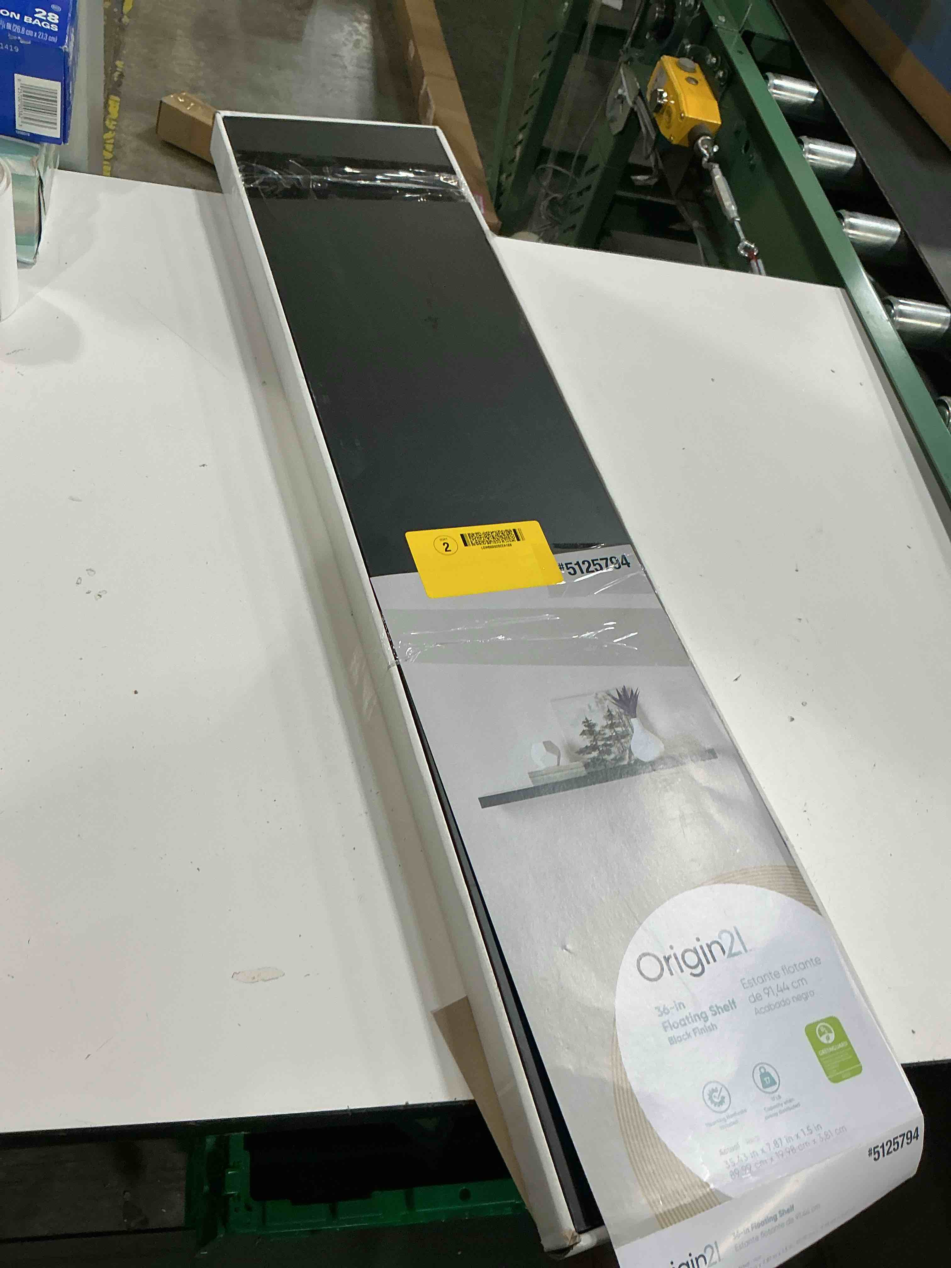 Condition photo showing As Is for allen + roth 7.8-in d x 35.4-in l black mdf rectangular floating shelf
