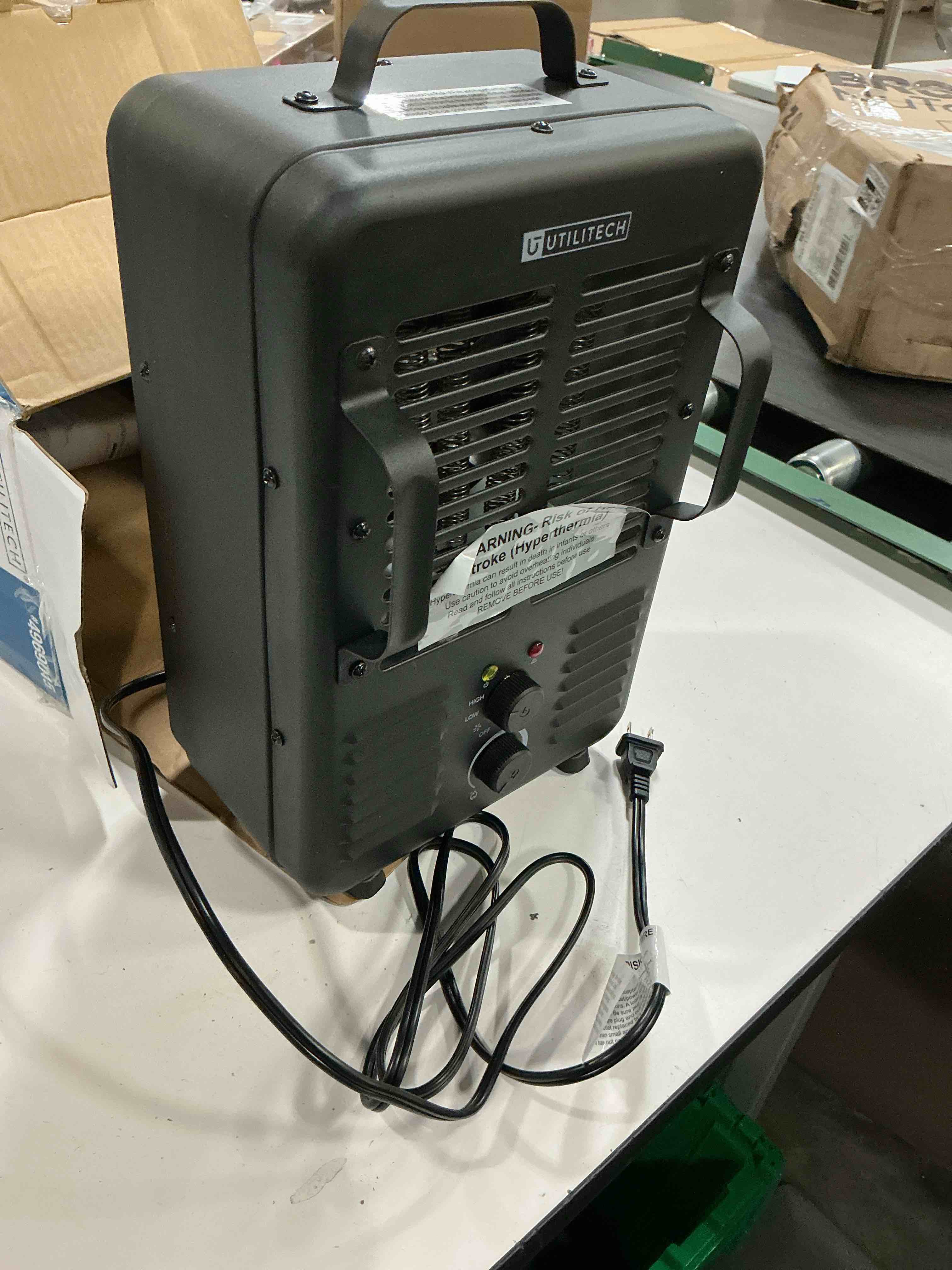 Condition photo showing As Is for utilitech 1500 -watt utility fan utility indoor electric space heater with thermostat