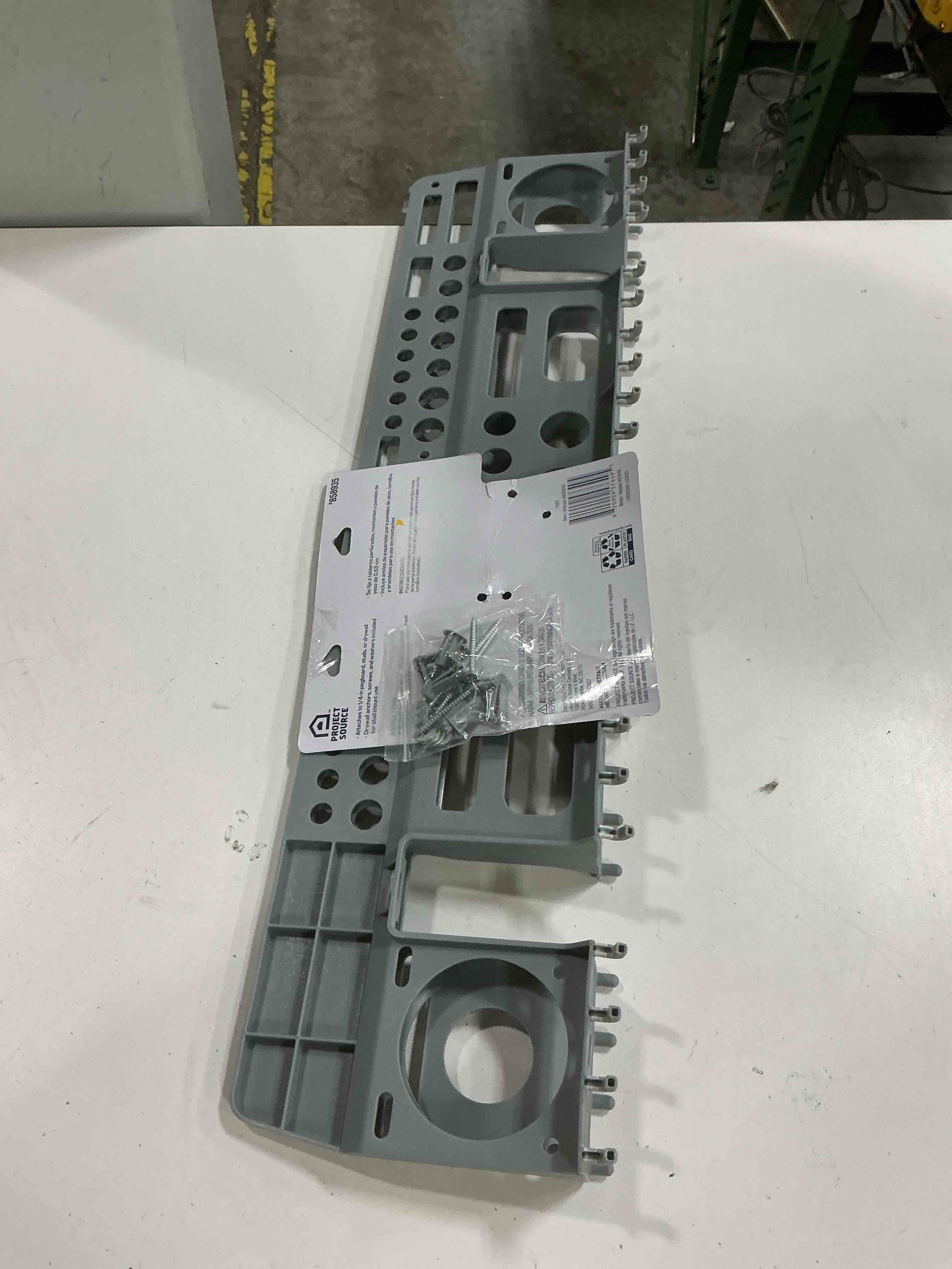 Condition photo showing As Is for blue hawk 1-piece plastic pegboard tool holder (actual: 24.41-in 6.38-in)