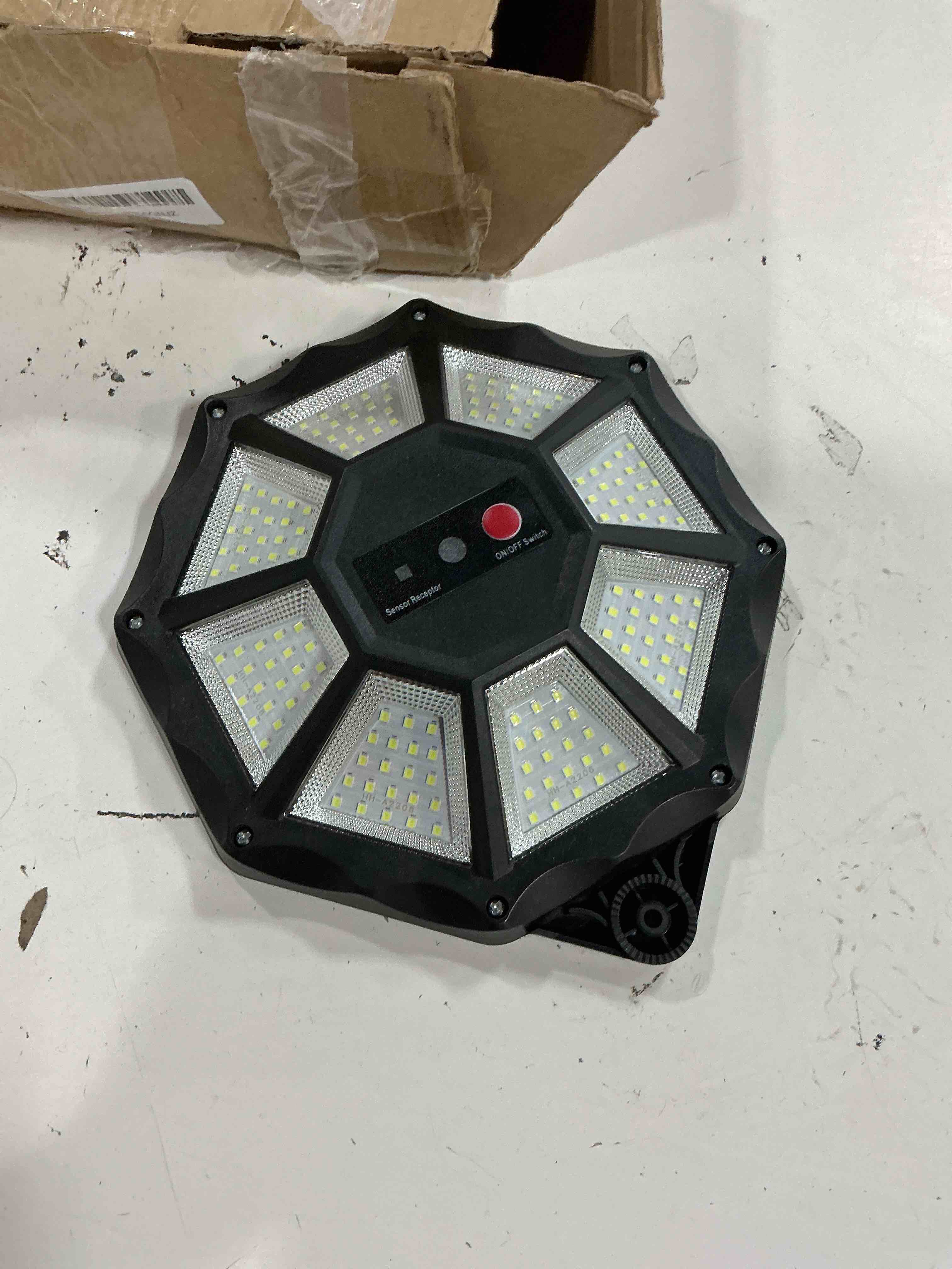 Condition photo showing As Is for okpro solar lights outdoor, 168led 6500k flood light dusk to dawn, 8 sides solar outdoor lights with motion sensor, ip66 waterproof solar street lights outdoor for yard, pools(2 pack) 6500k 2pcs 2 (missing parts)