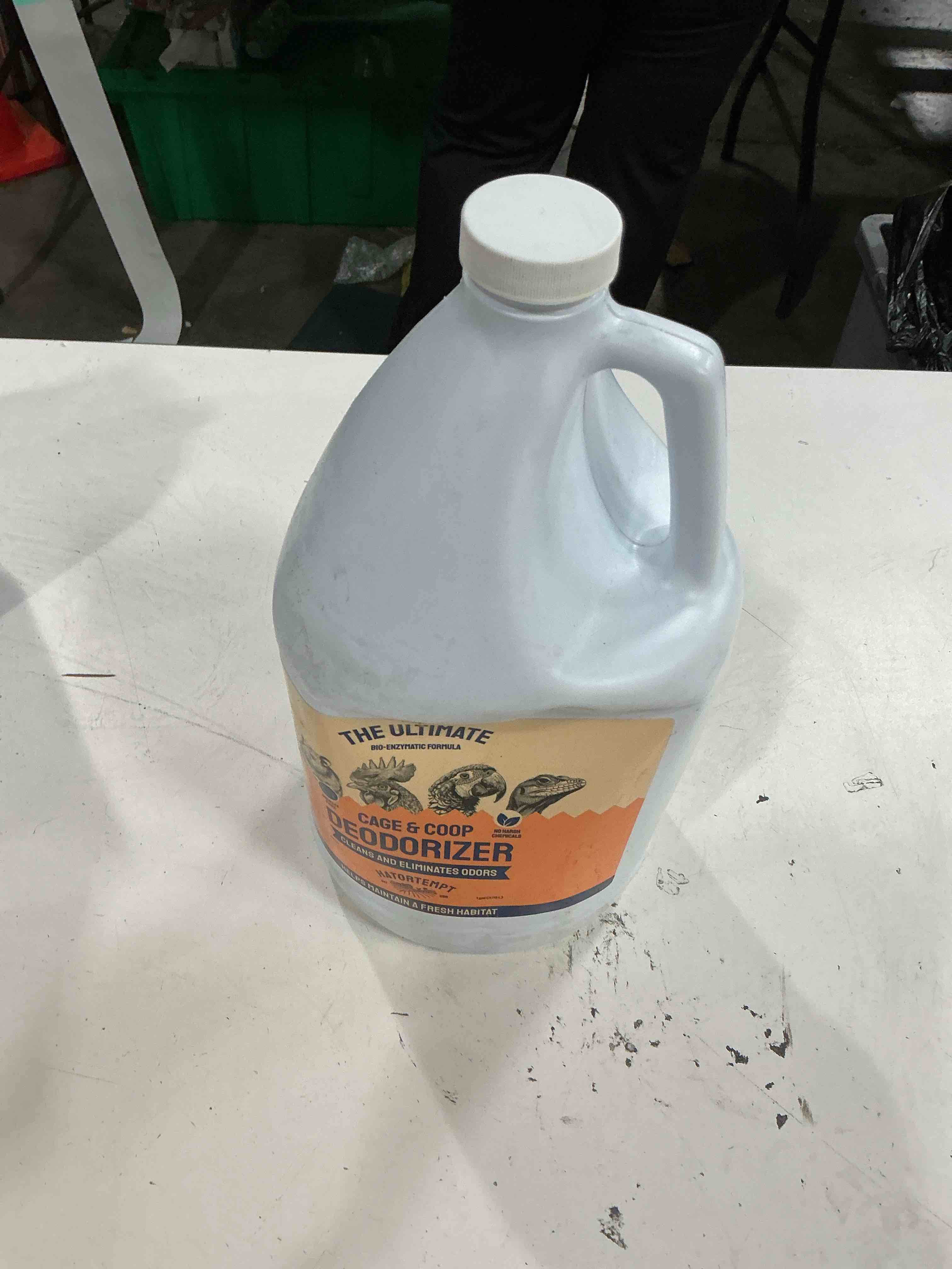 Condition photo showing As Is for the ultimate cage & coop deodorizer 1 gallon (used)