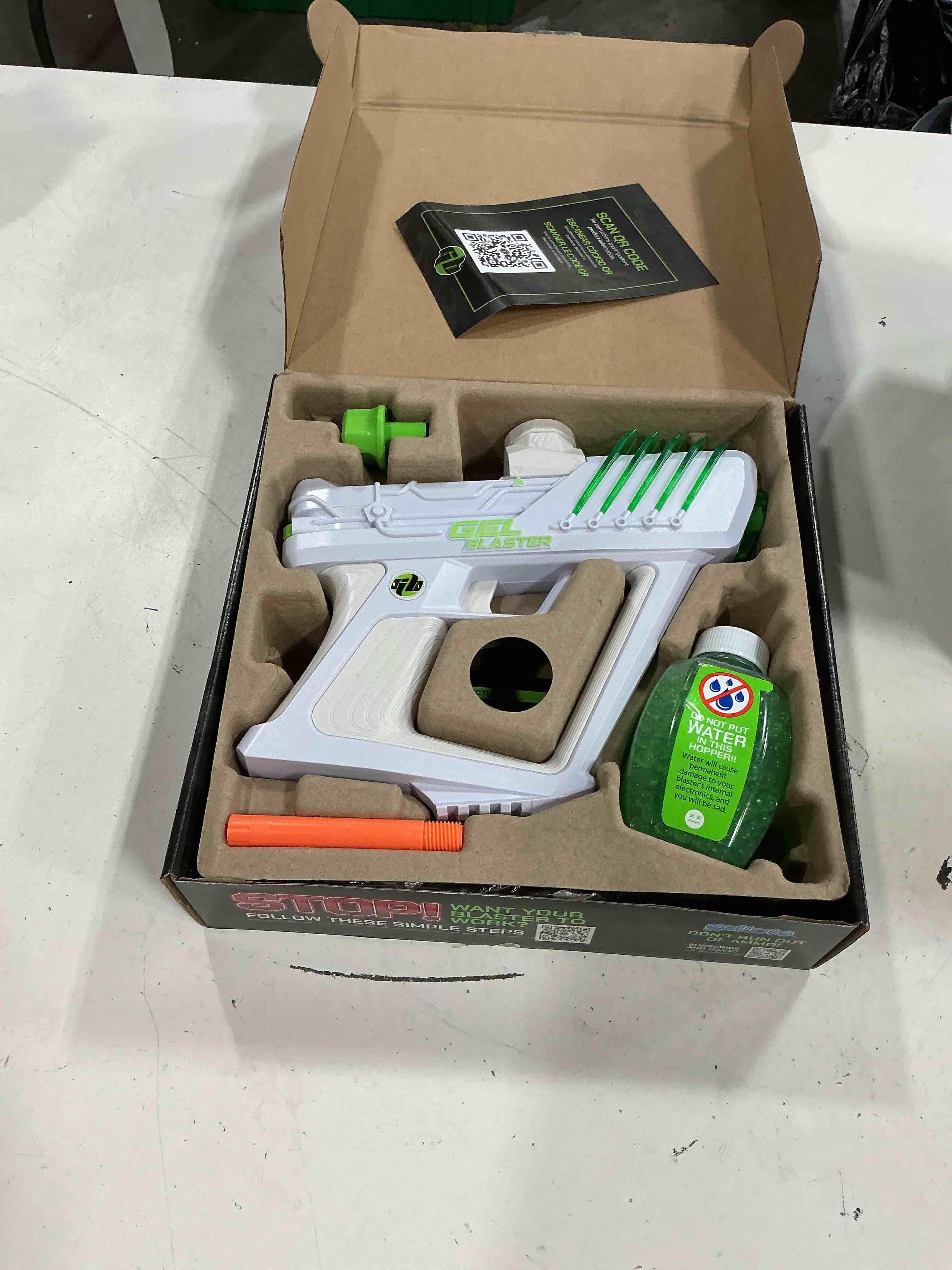 Condition photo showing New/Like New for gel blaster surge 1.5 electric green water-based gellet blaster with 10 000 electric green gellet pack