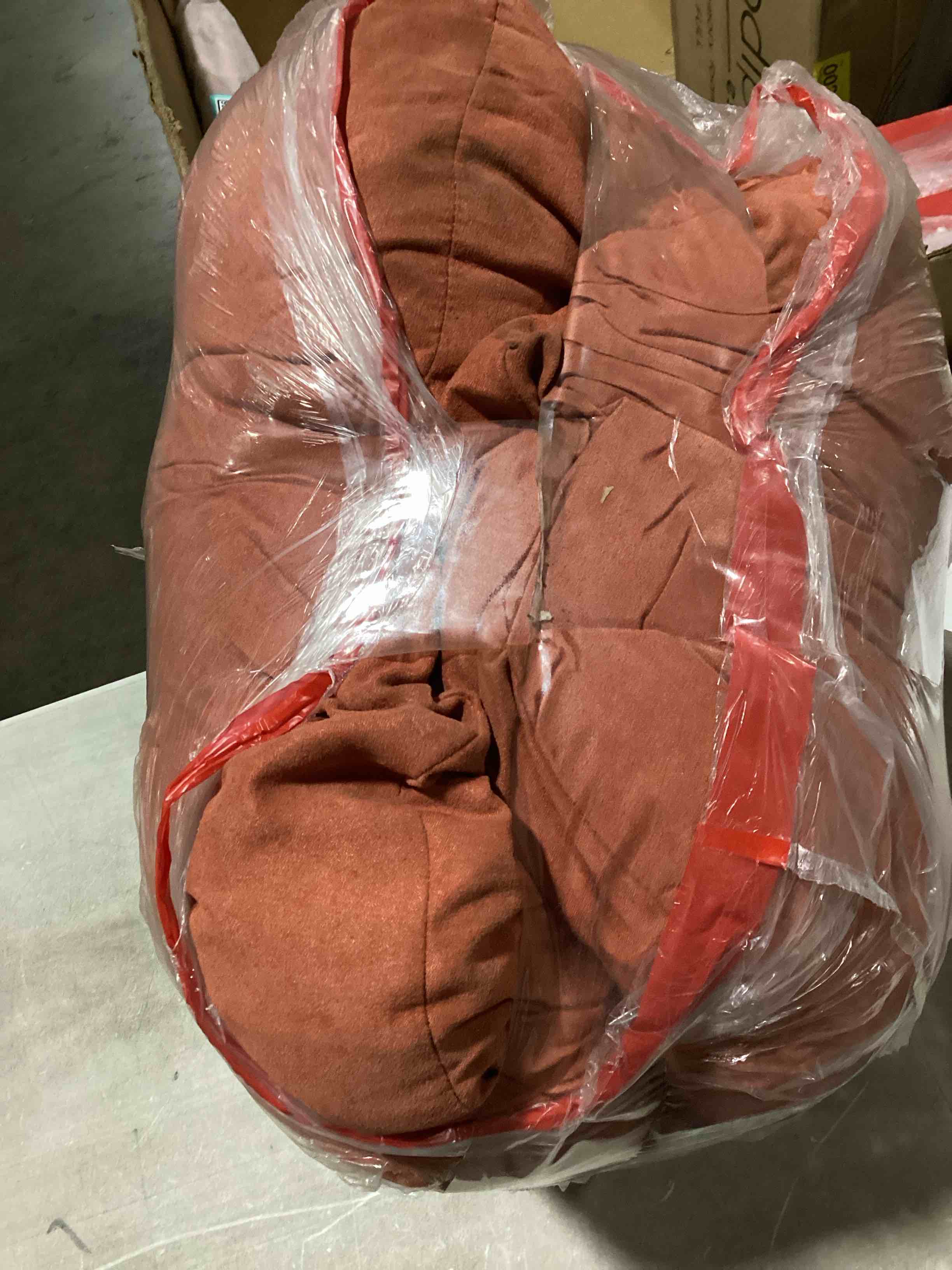 Condition photo showing As Is for cushion, in color cinnamon spice (orange)