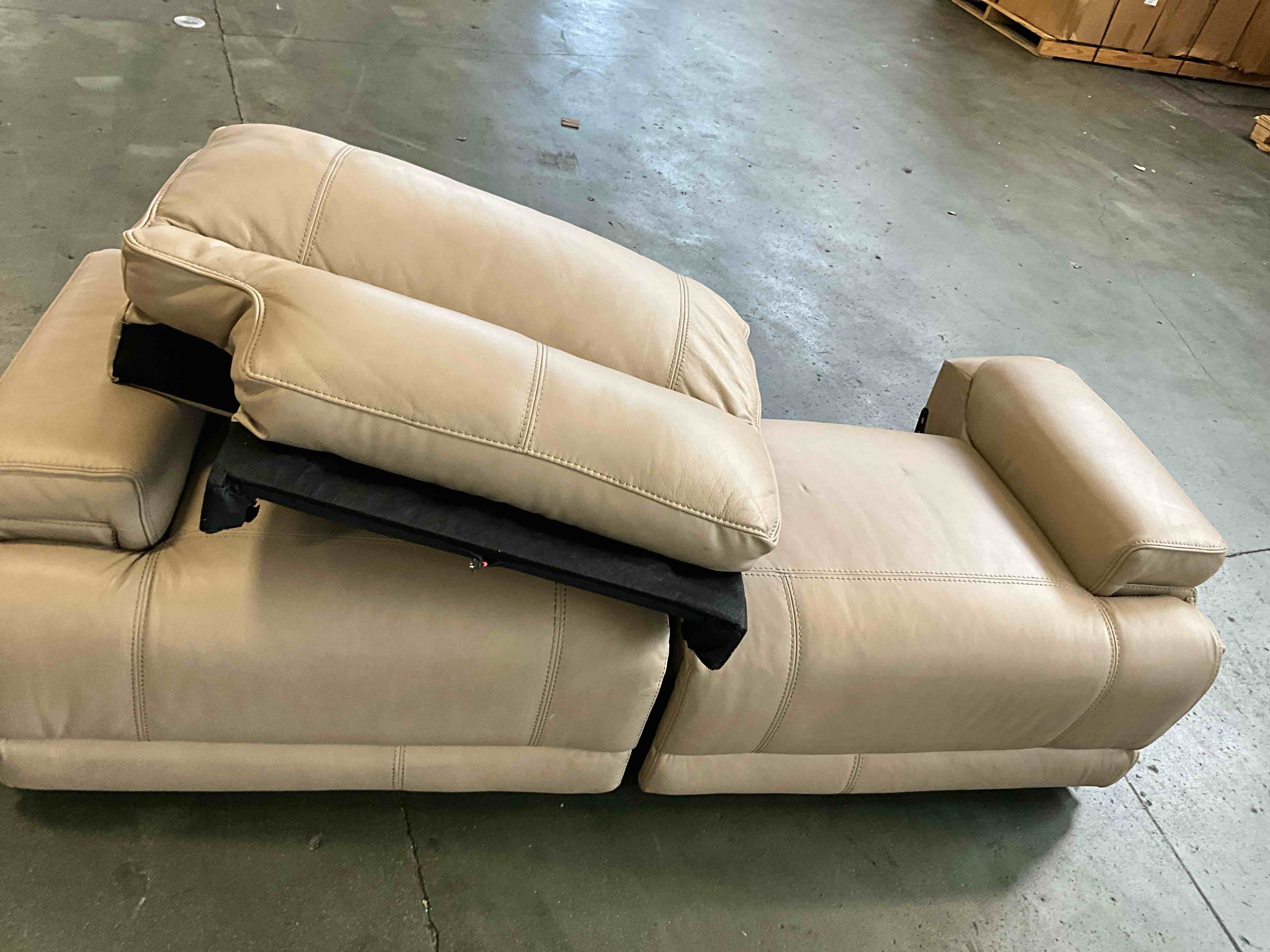 Condition photo showing As Is for parker house loveseat recliner 