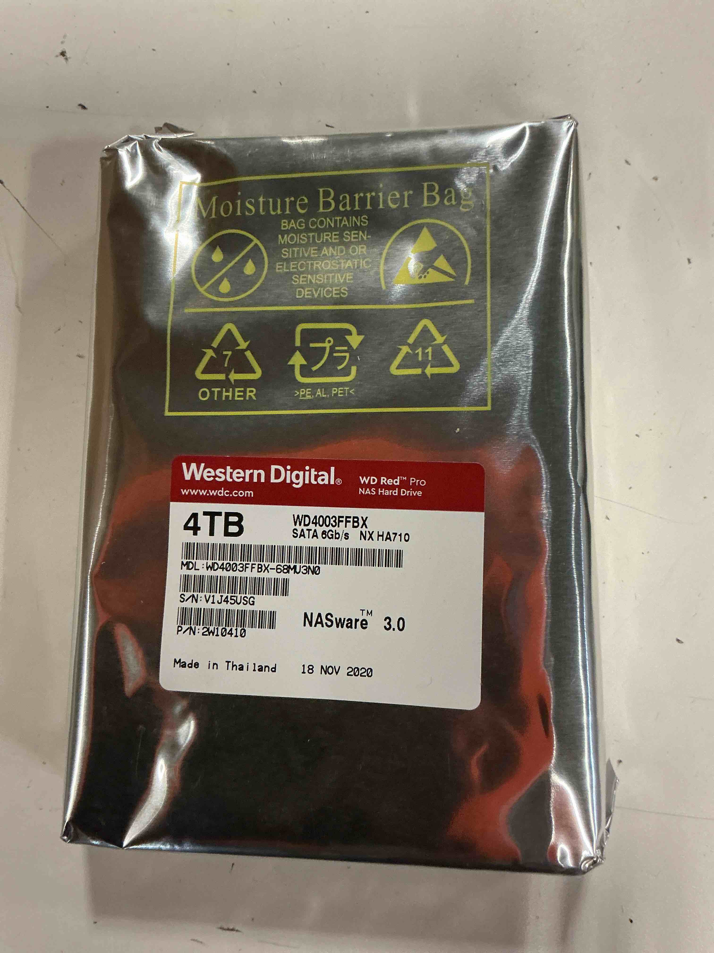 Condition photo showing New/Like New for 4tb western digital wd4003ffbx red pro nasware sata 6gbs hdd 3.5" raid 7200rpm