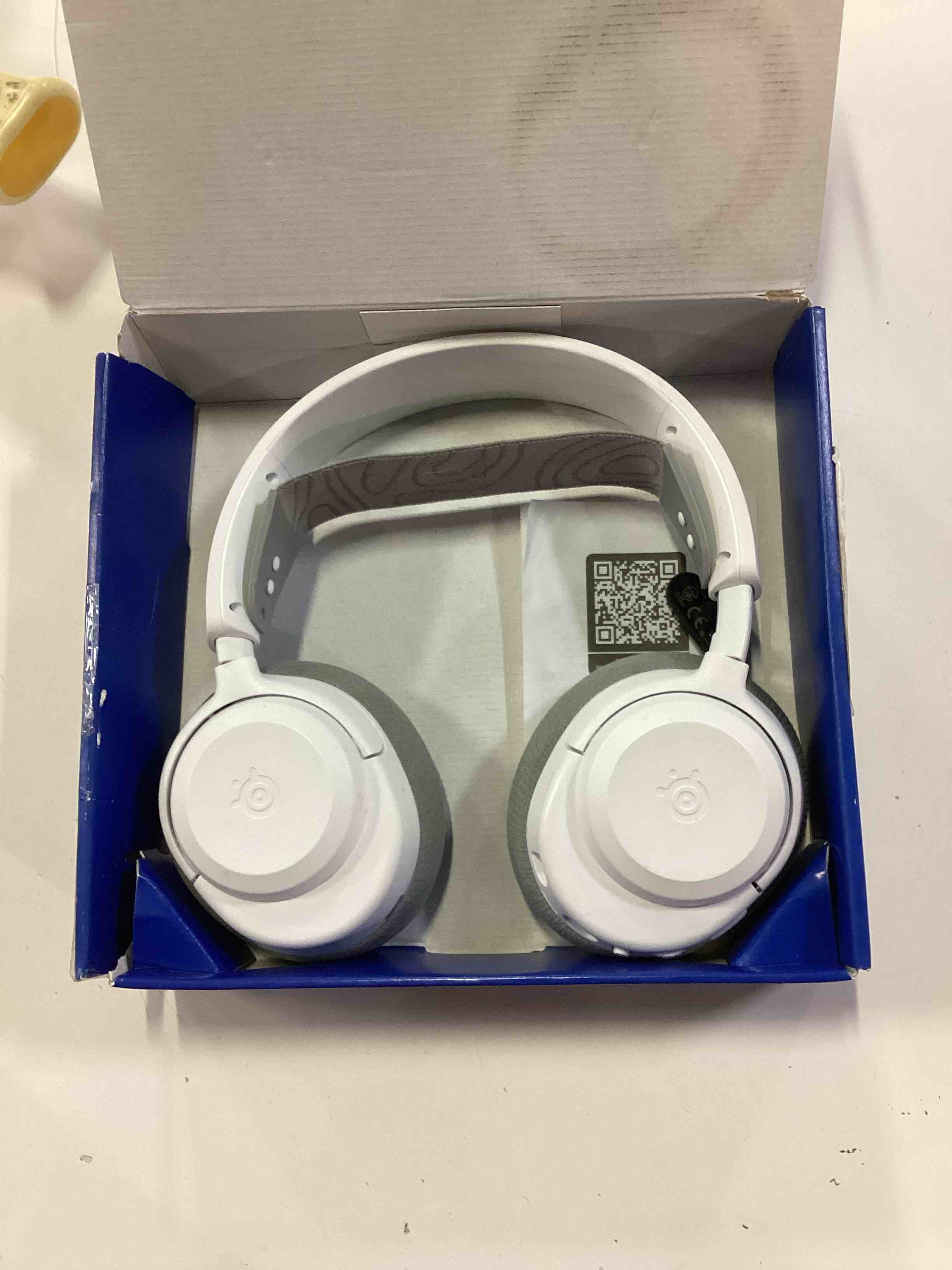 Condition photo showing As Is for 61687 arctis nova 3p wireless gaming headset 40hr battery bluetooth ps5 ps4 pc switch mobile, white