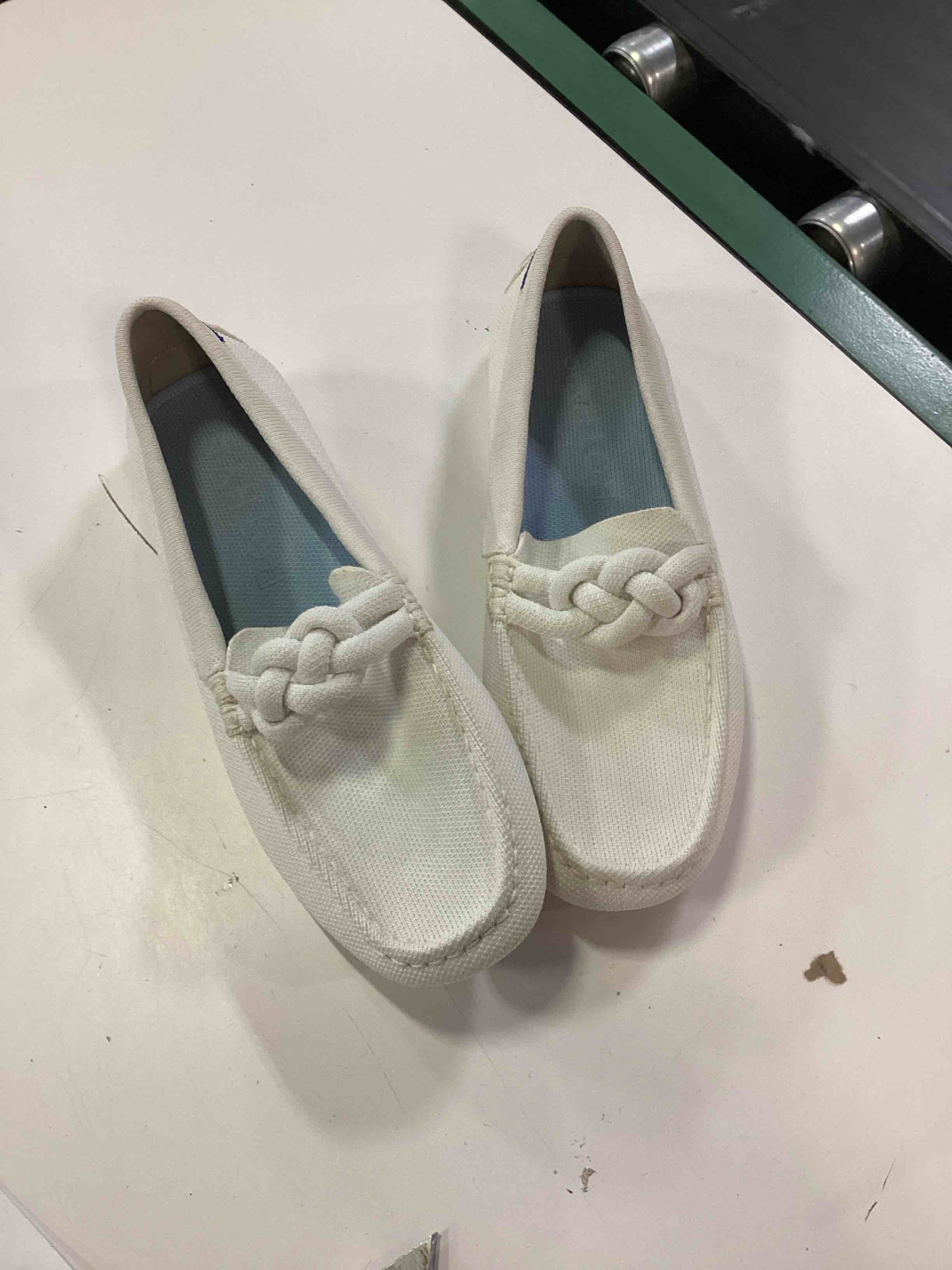 Condition photo showing Good Condition for women's brand new rothy’s the braid driver. color: cream (size unknown)