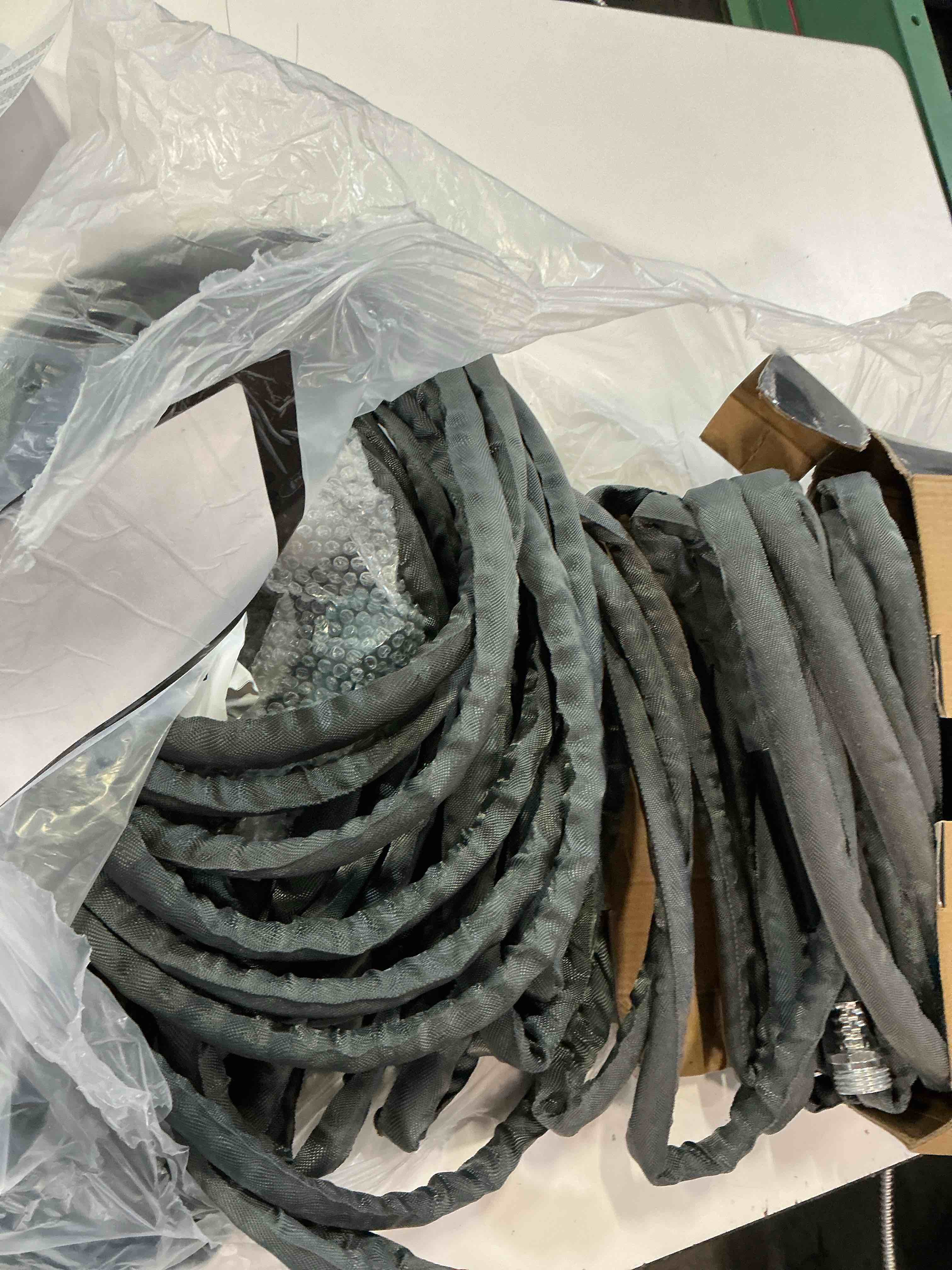 Condition photo showing Good Condition for relxitl garden hose 100feet, water hose with 10 function hose nozzle, non-expandable hose, tough & flexible, lightweight, crush resistant fittings, kink & tangle free, rust proof for watering 100ft gray