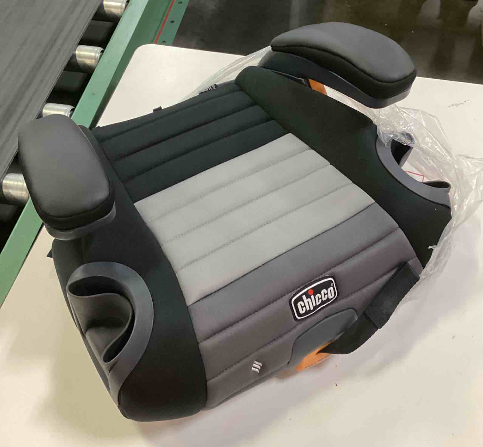 Condition photo showing As Is for chicco gofit cleartex plus backless booster car seat, latch, 40-110 lbs | obsidian/black, ages 4+, ergoboost foam padding, flame retardant-free, greenguard gold, washable pad, portable booster seat