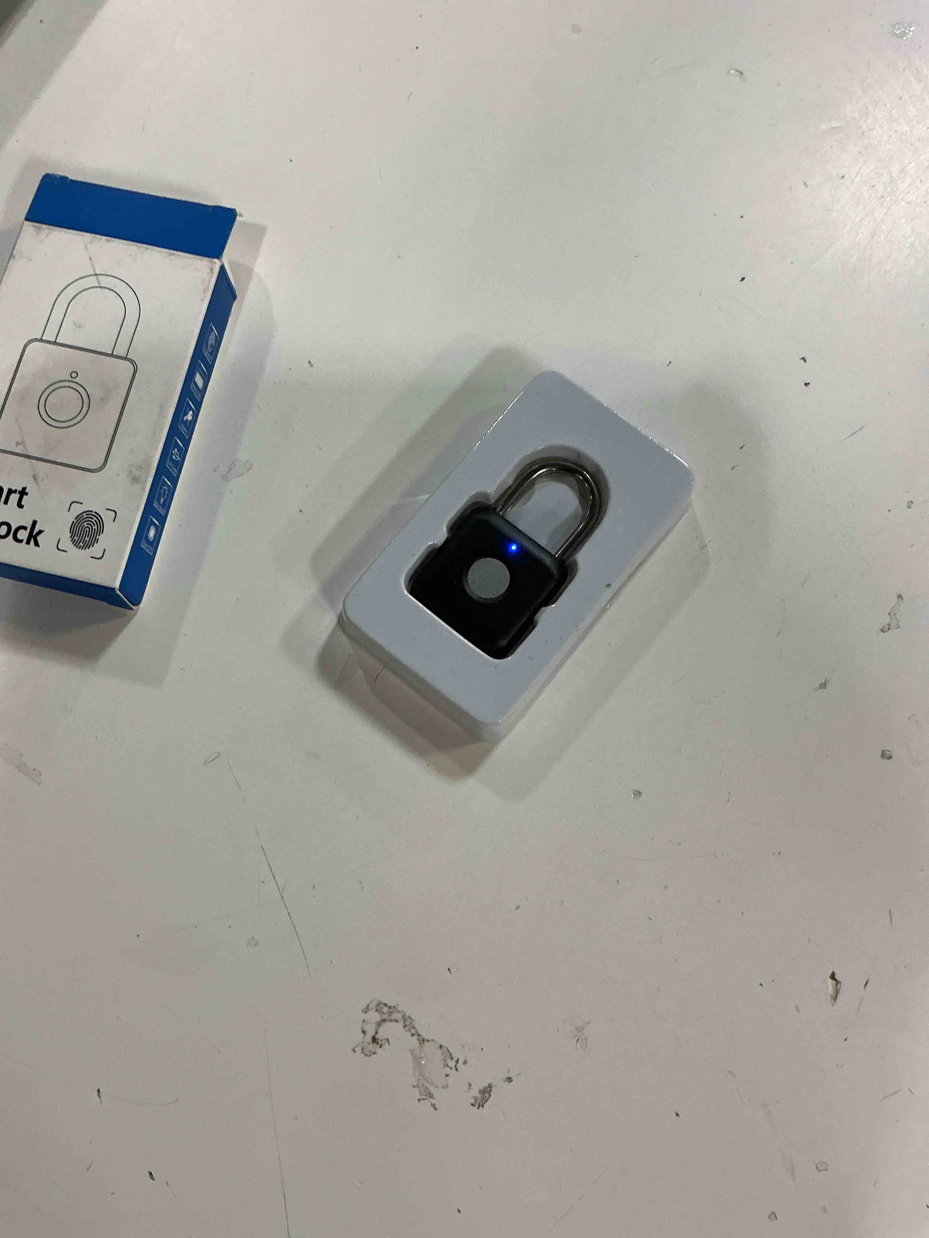 Condition photo showing As Is for (missing cable)fingerprint padlock,smart padlock app control,gym locker lock,fingerprint lock usb rechargeable for gym locker,locker, school,storage black blackshackle