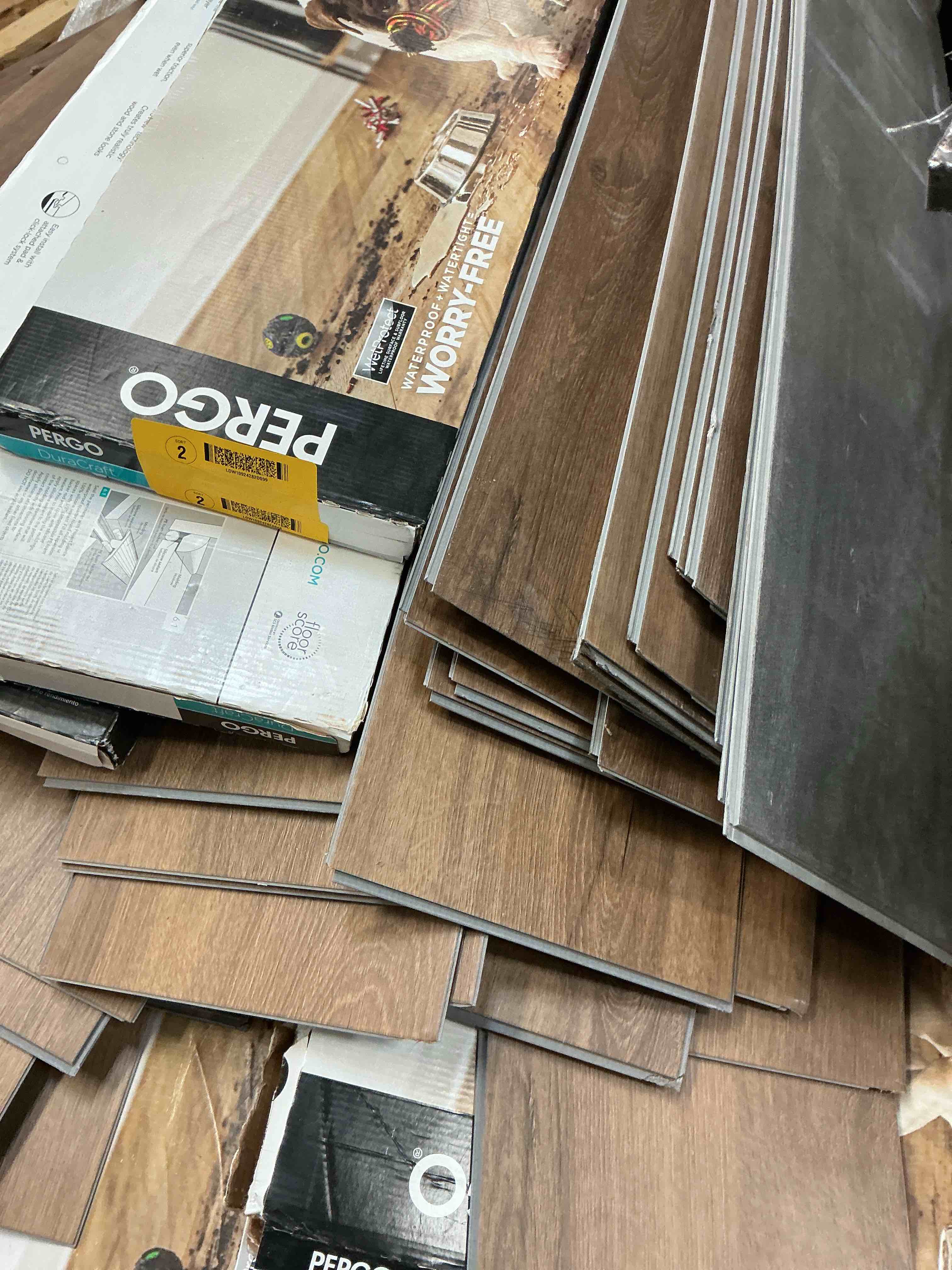 Condition photo showing As Is for  pergo duracraft seville oak 22-mil x 9-1/2-in w x 47-in l waterproof luxury vinyl plank flooring