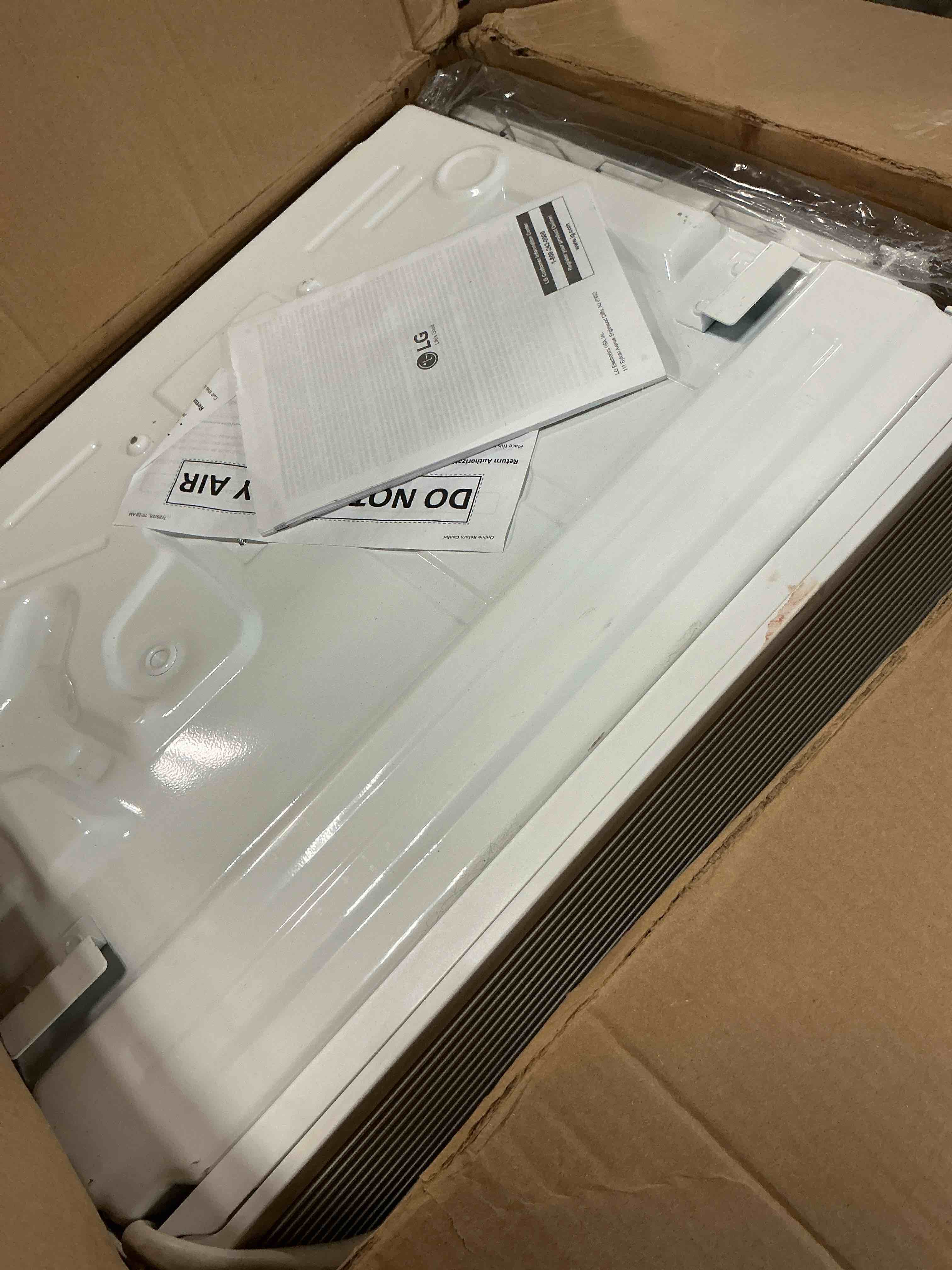 Condition photo showing As Is for lg lw1025rsmx window conditioner, wi-fi enabled w/remote, 450 sq.ft, 4-way air deflection, 2 cooling and fan speeds with auto fan function, 115v, 10,000 btu, white