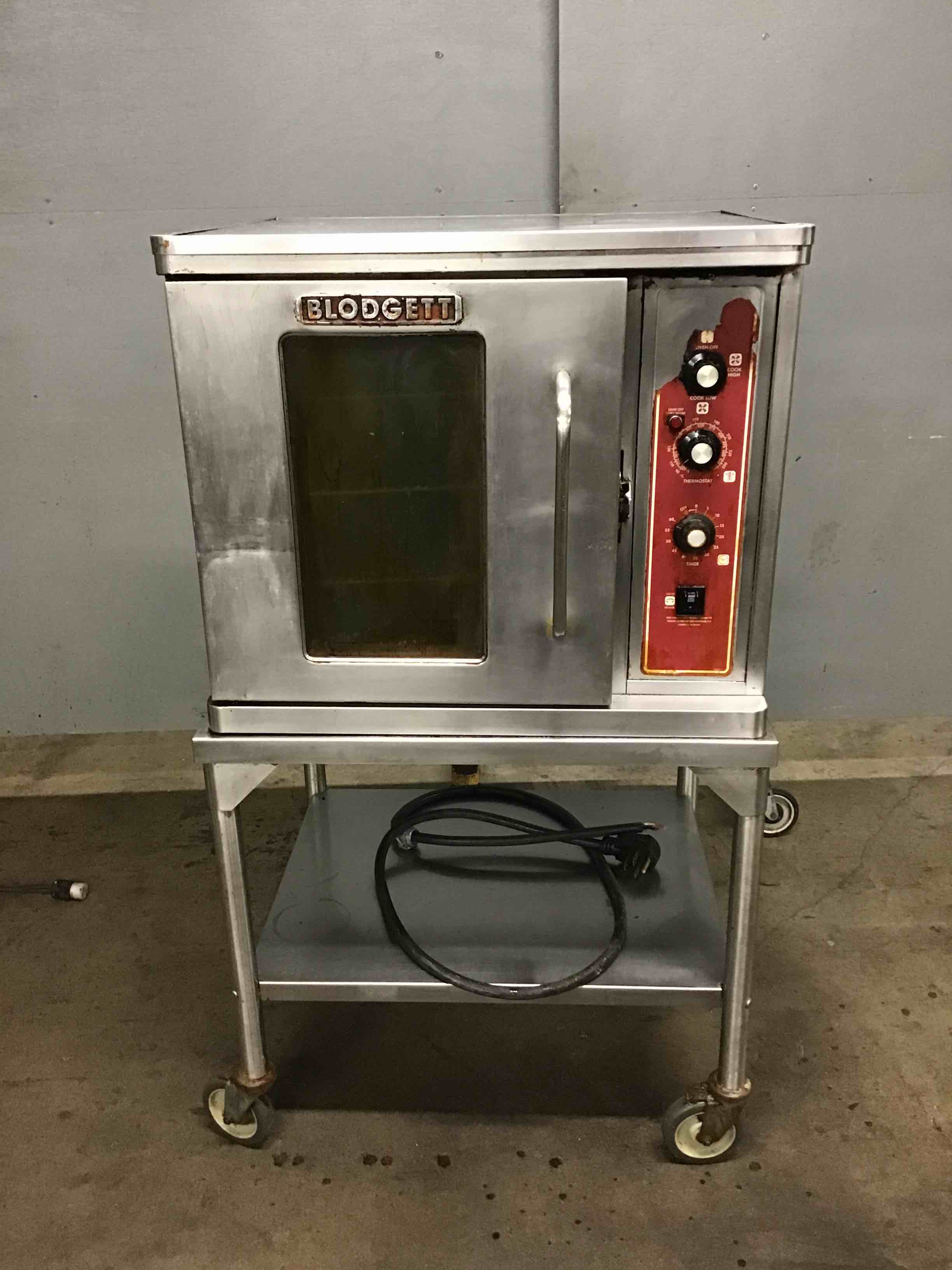 BLODGETT HALF SIZE STAINLESS STEEL ELECTRIC CONVECTION OVEN ON STAND WITH CASTERS