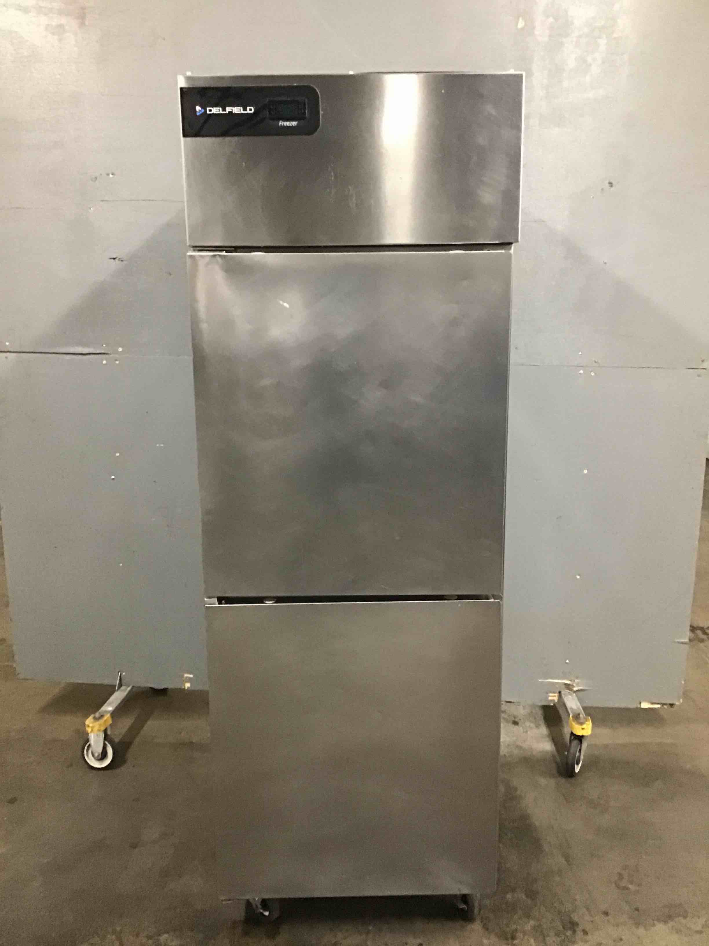 DELFIELD STAINLESS STEEL 2 DOOR REACH IN FREEZER ON CASTERS