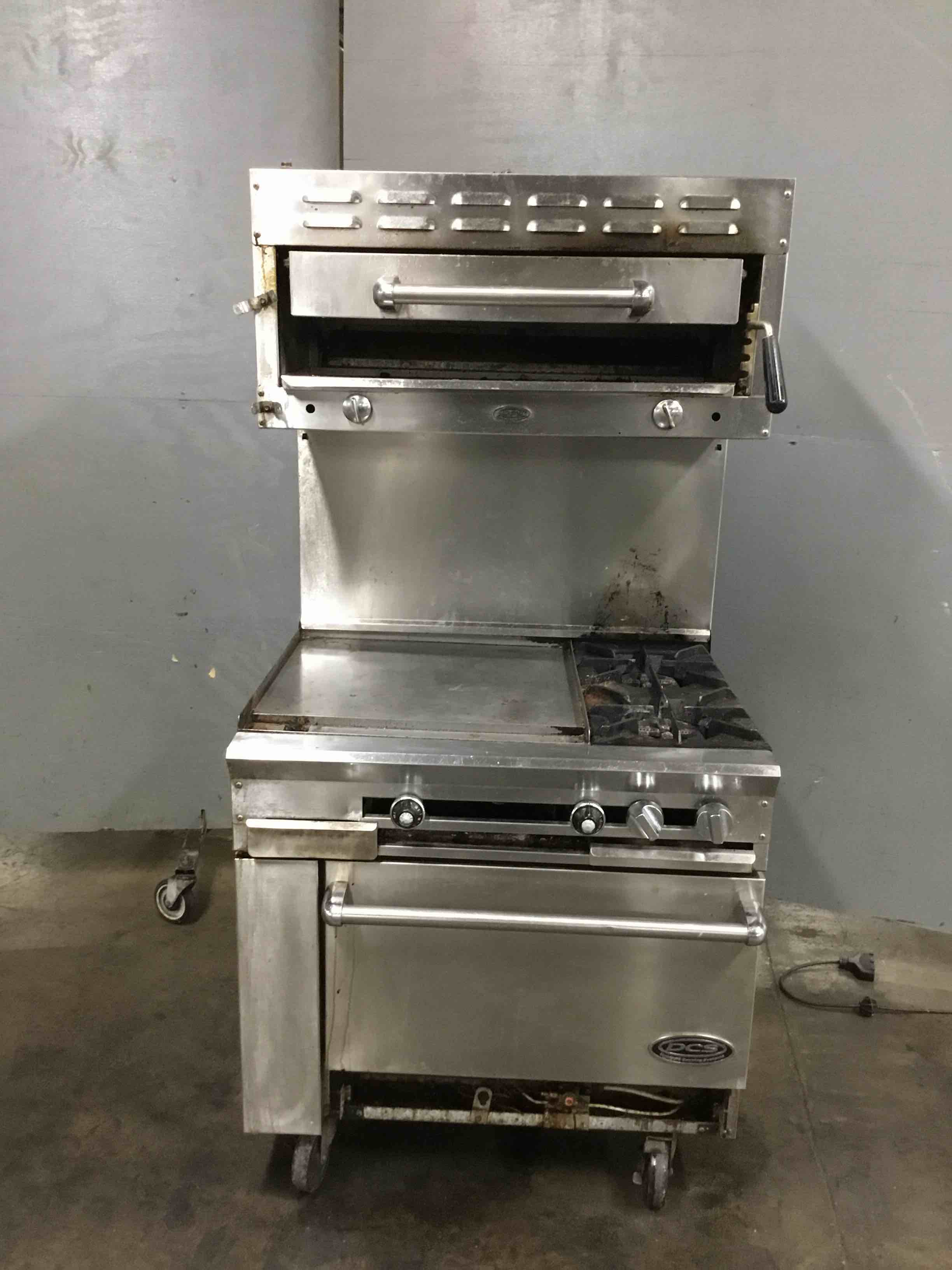 DYNAMIC COOKING SYSTEMS STAINLESS STEEL NATURAL GAS 2-BURNER RANGE WITH 24 INCH FLAT GRILL, 36 INCH SALAMANDER, AND OVEN