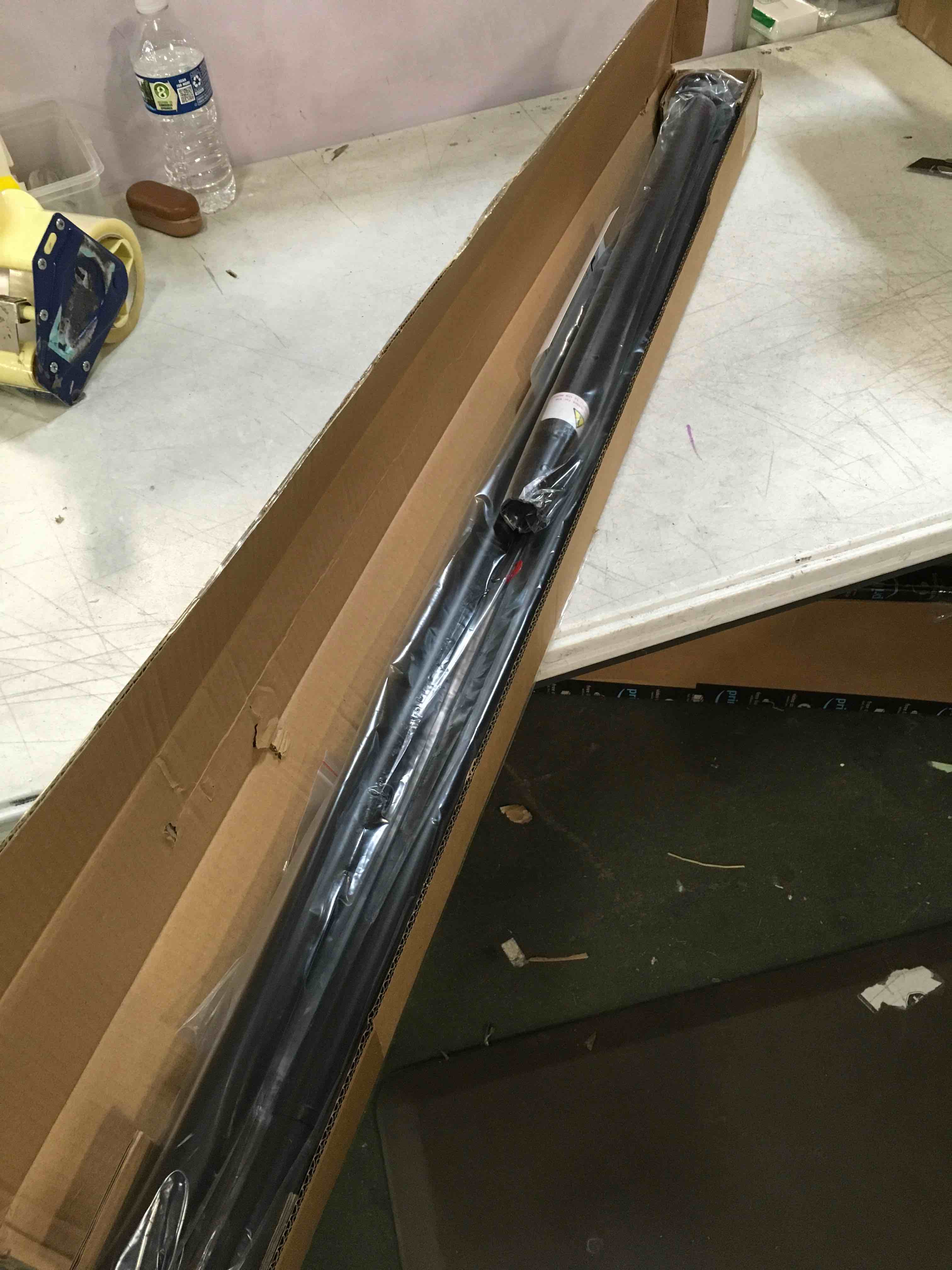 Allzone spring loaded tension rod