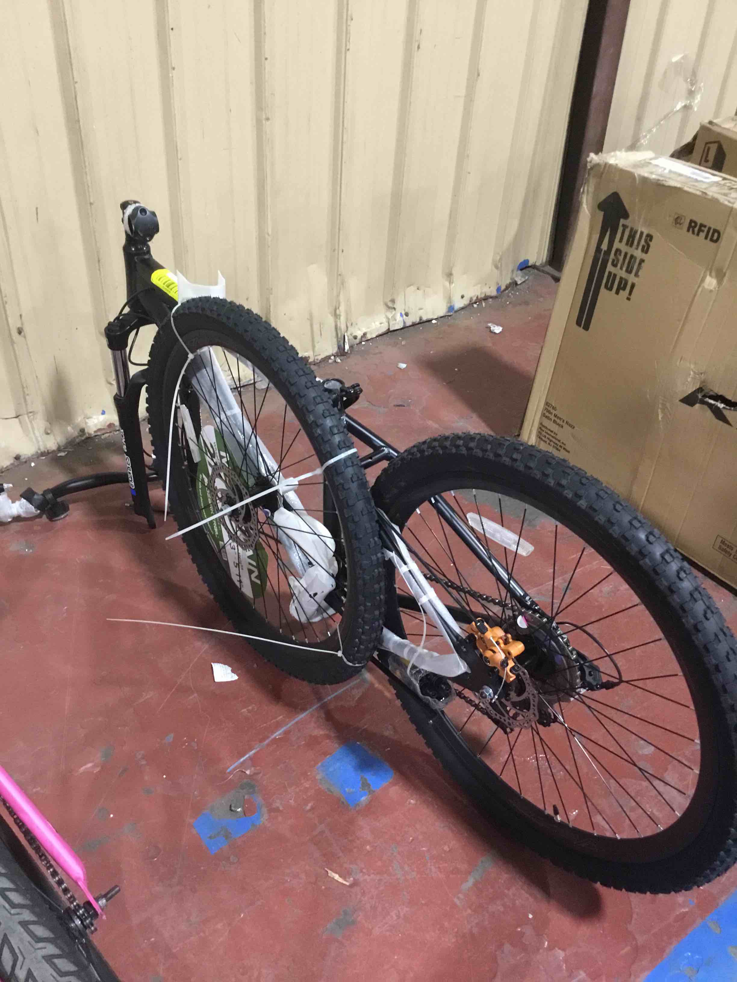 Ozark Trail mountain bike, 27.5 bike OPEN BOX, pedals not put on, missing brake cable, front break could be on alignment 