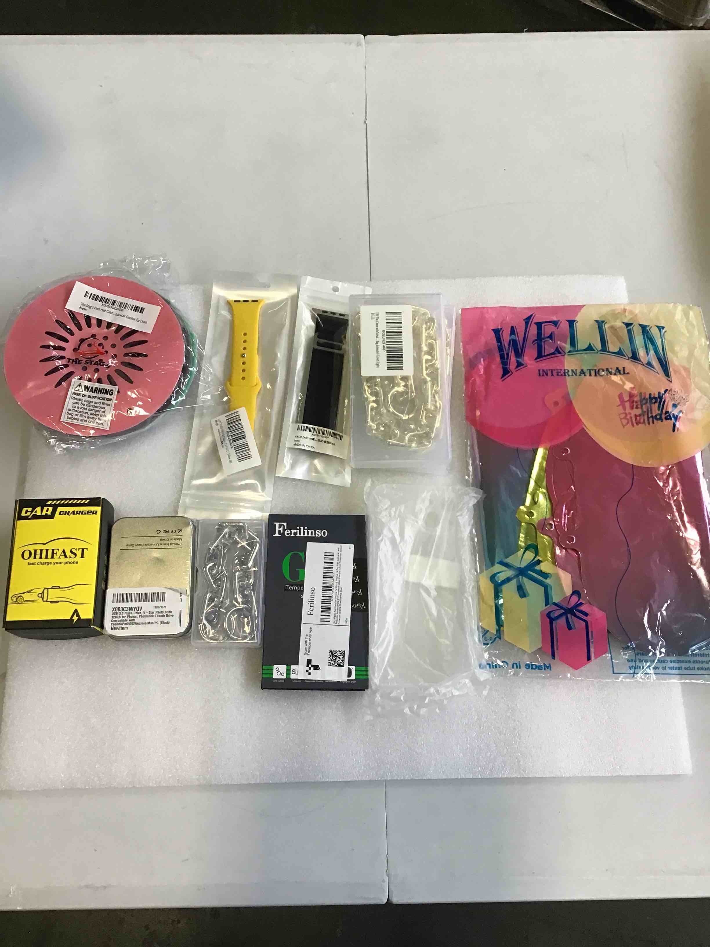Assorted Merchandise (Hair Catcher for Drain, Bracelet for Watch, Chain with Metal for Bag Extender, Car Charger, IPhone Case)