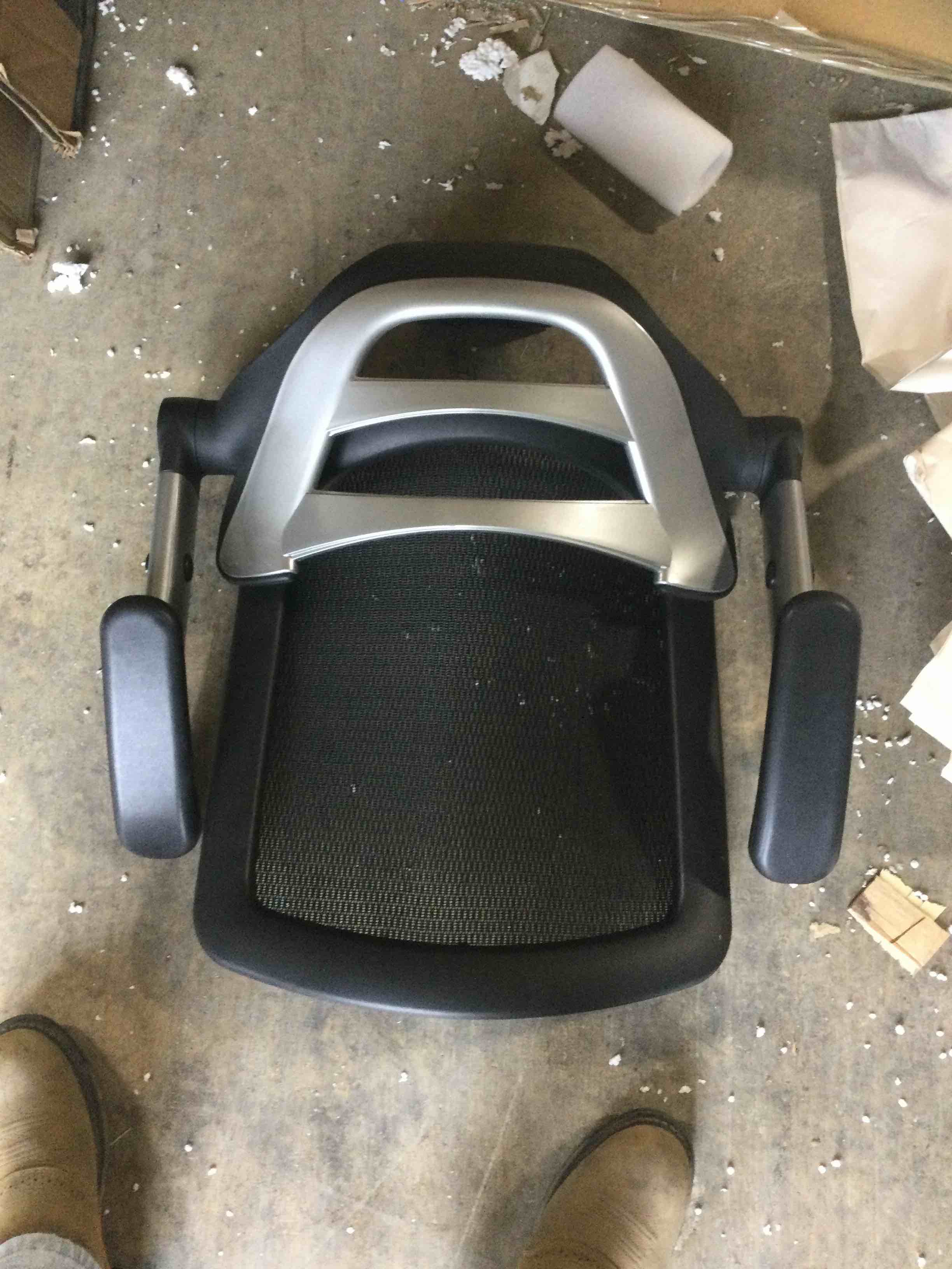 computer desk chair, brand and model unknown. 