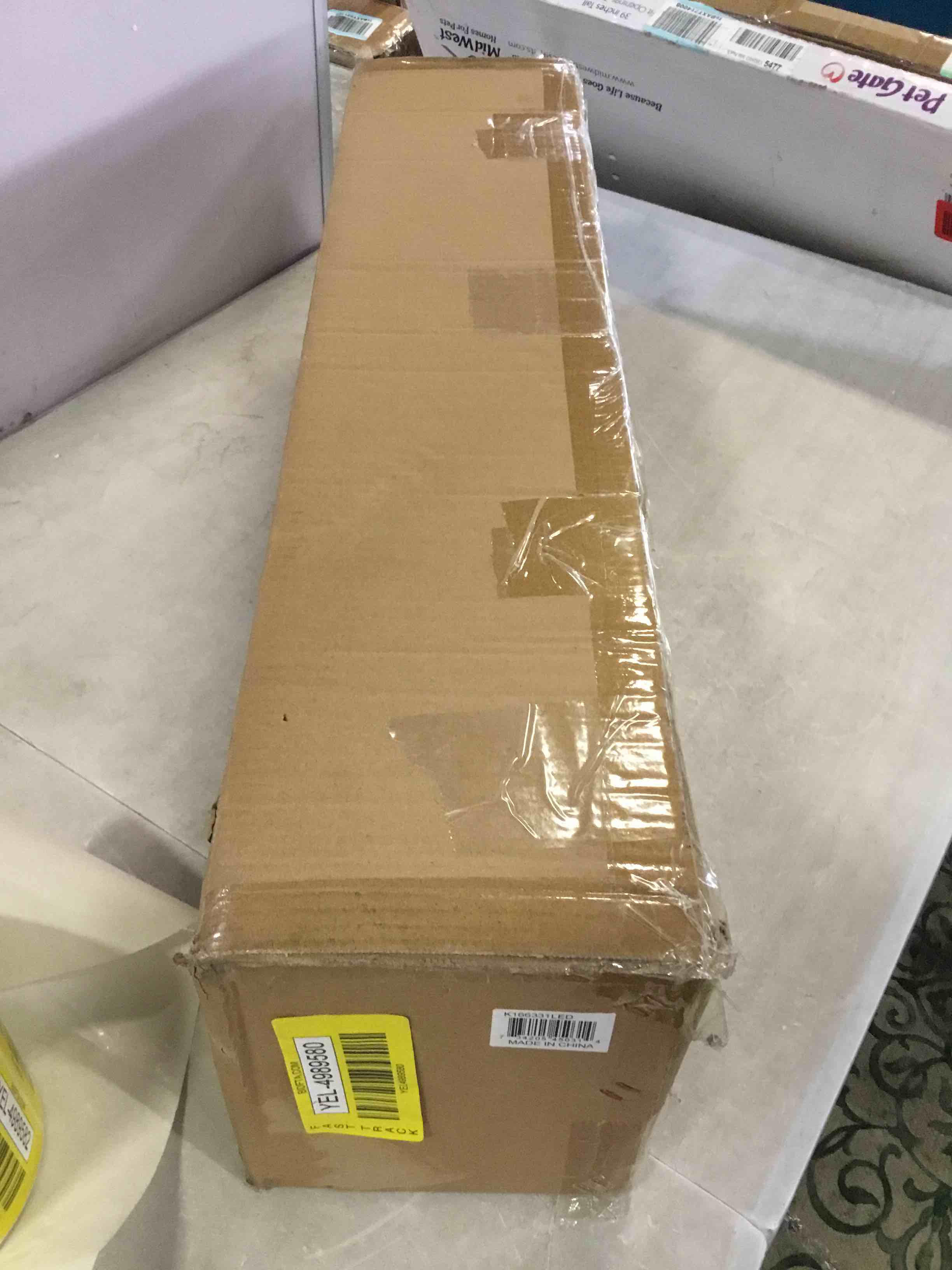 https://s3.amazonaws.com/lotting-images-prod/bidfta/YEL4989580_1694635628881.jpeg