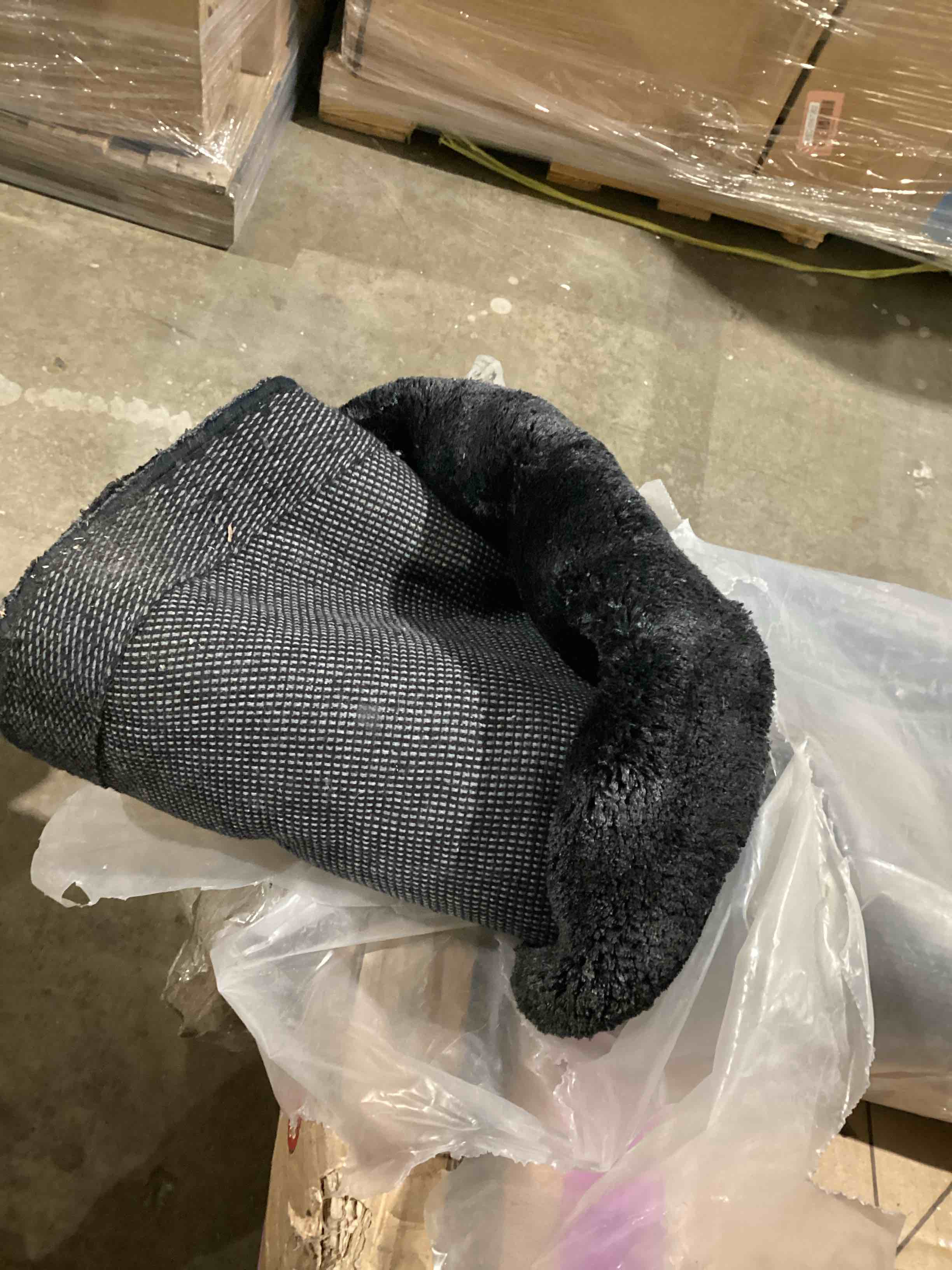 black and grey area rug (exact size unknown- at least 7 ft long) 