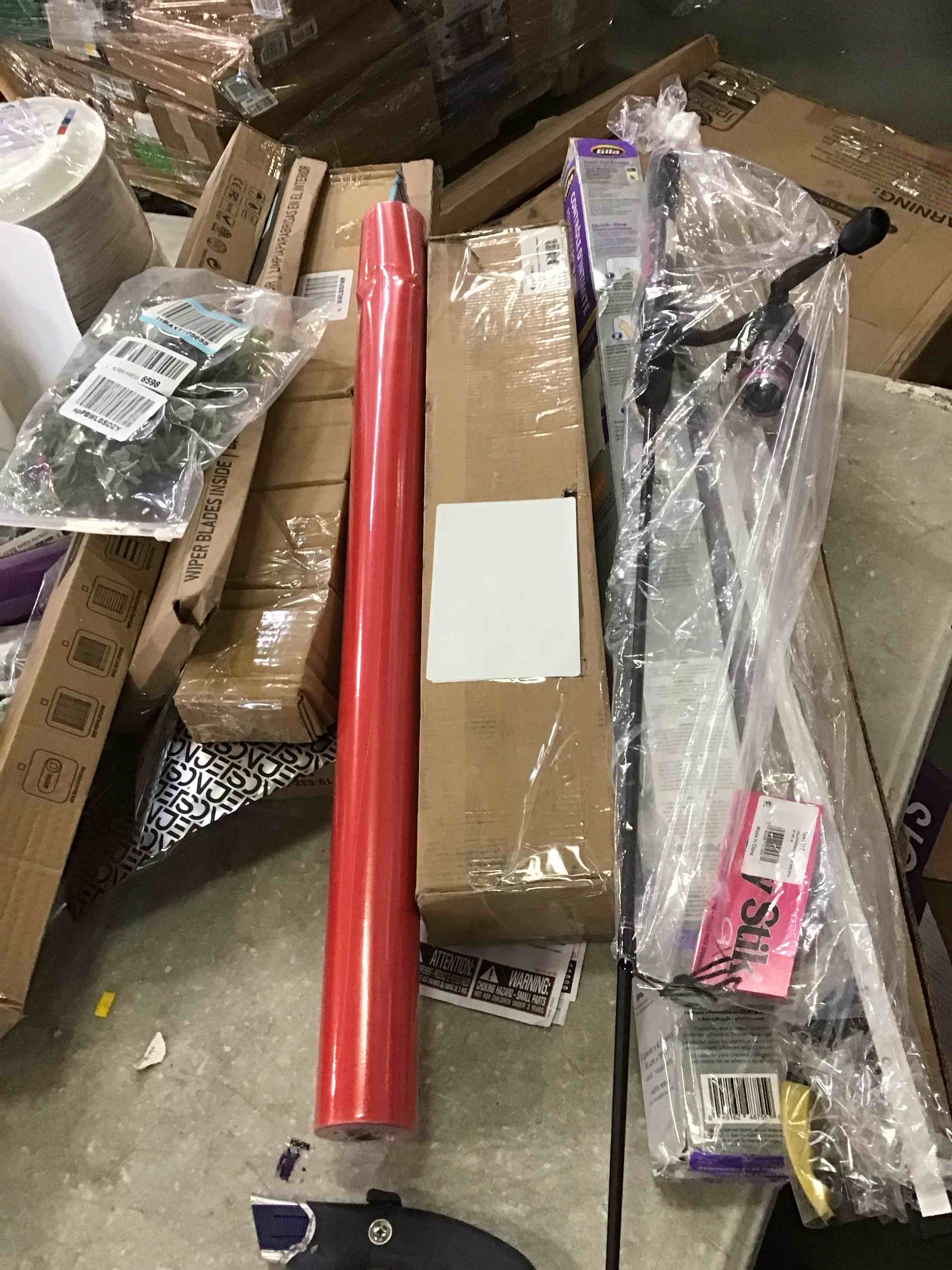 assorted retractable baby gate,fishing pole,curtain rods,and more 