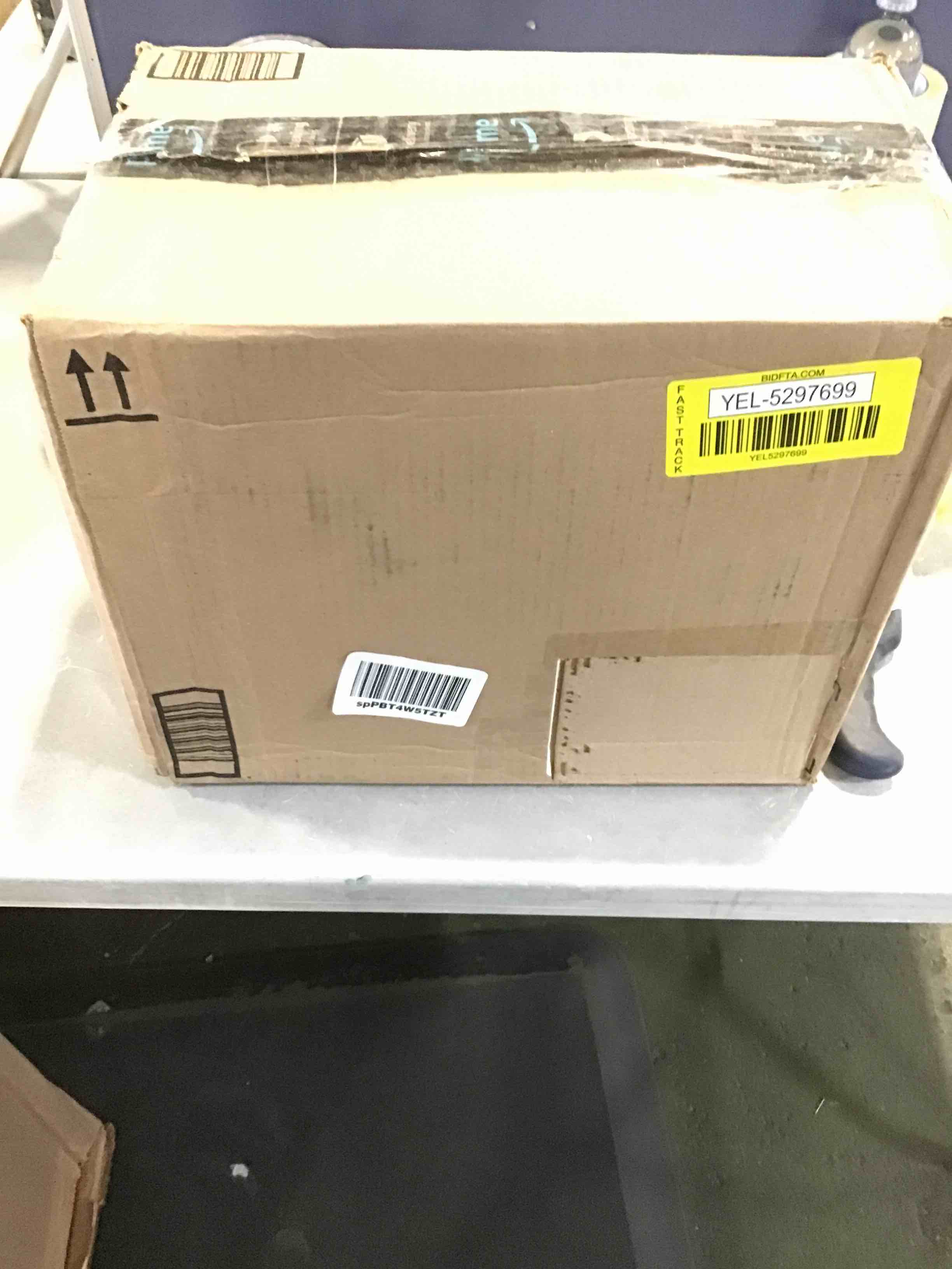 https://s3.amazonaws.com/lotting-images-prod/bidfta/YEL5297699_1690212263419.jpeg