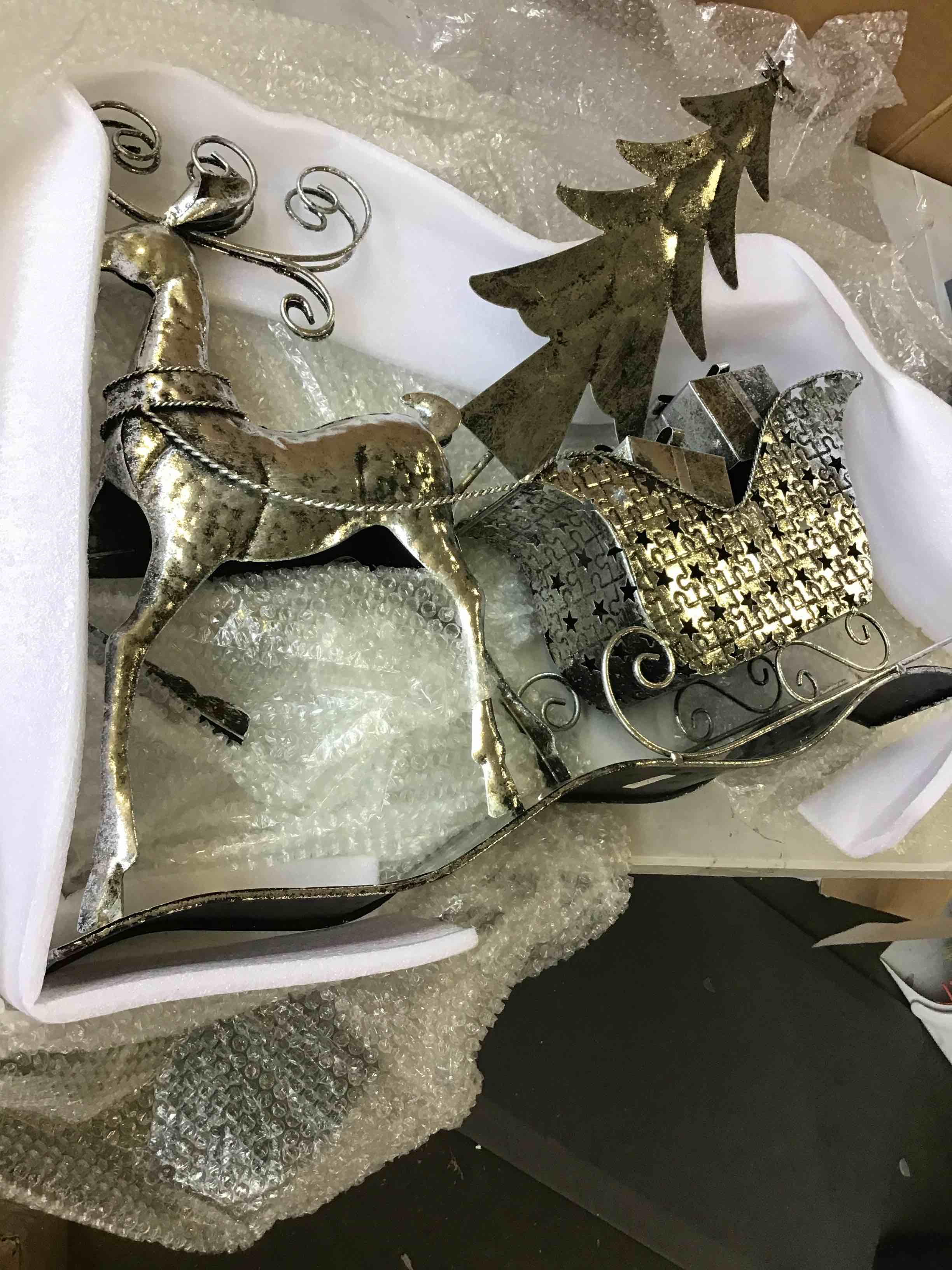 As is slim metal sleight & reindeer centerpiece  by Valerie silver