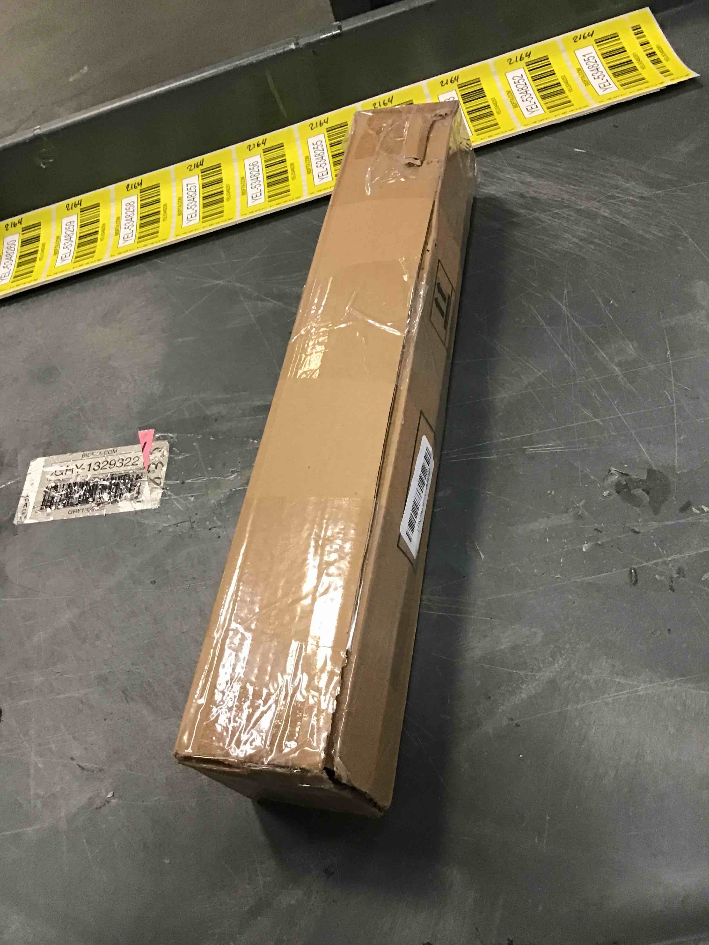 https://s3.amazonaws.com/lotting-images-prod/bidfta/YEL5348250_1690207044584.jpeg