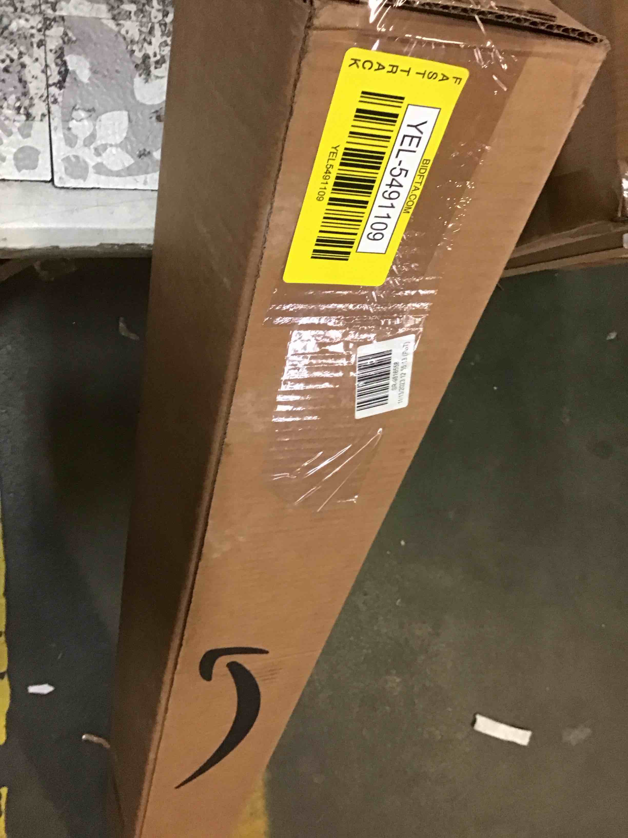 https://s3.amazonaws.com/lotting-images-prod/bidfta/YEL5491109_1702059862862.jpeg