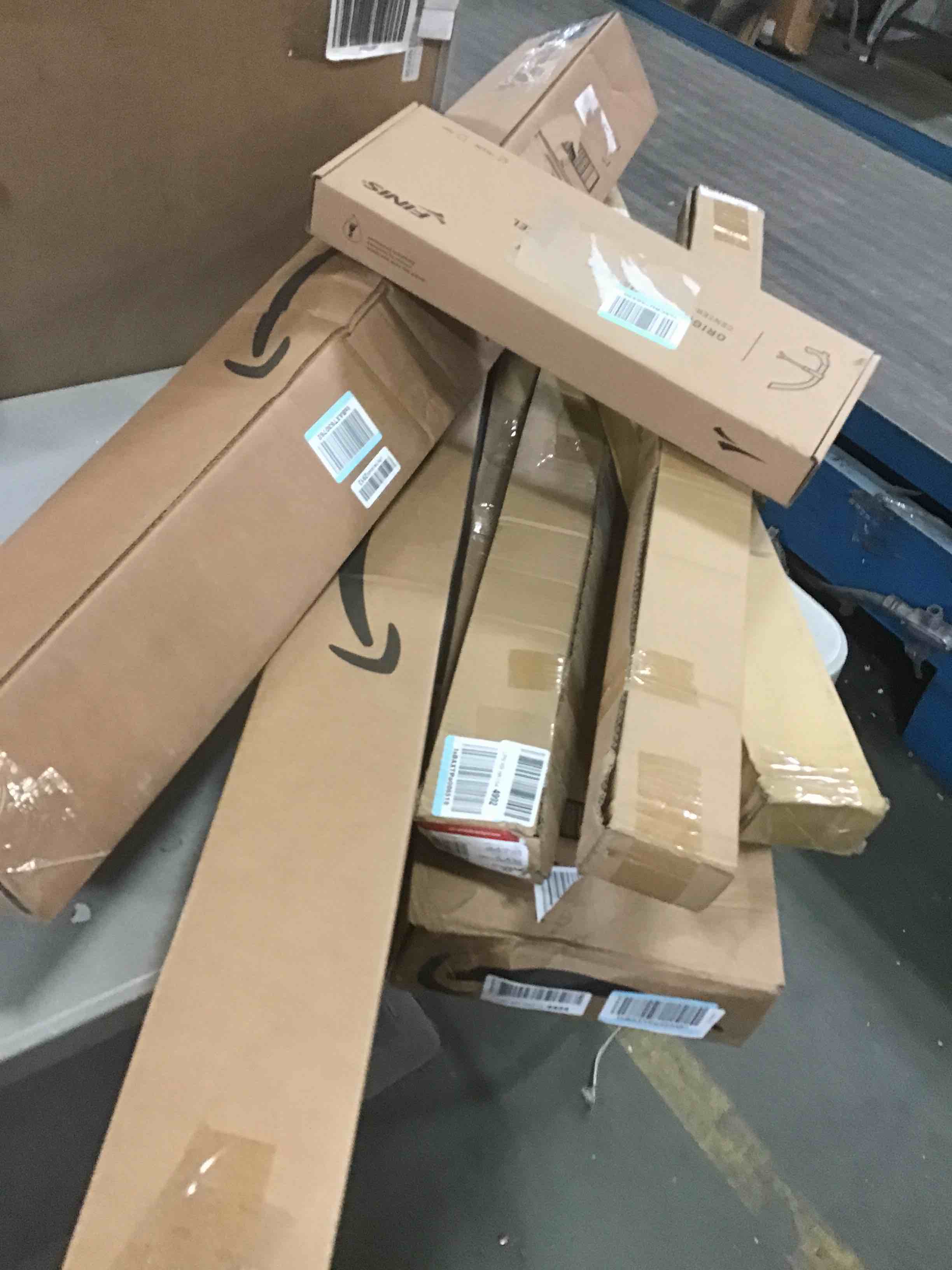 Assortment of Miscellaneous products (May Include cordless shade, curtain rods, retractable baby gate, Led universal linear lamp and more or other use)