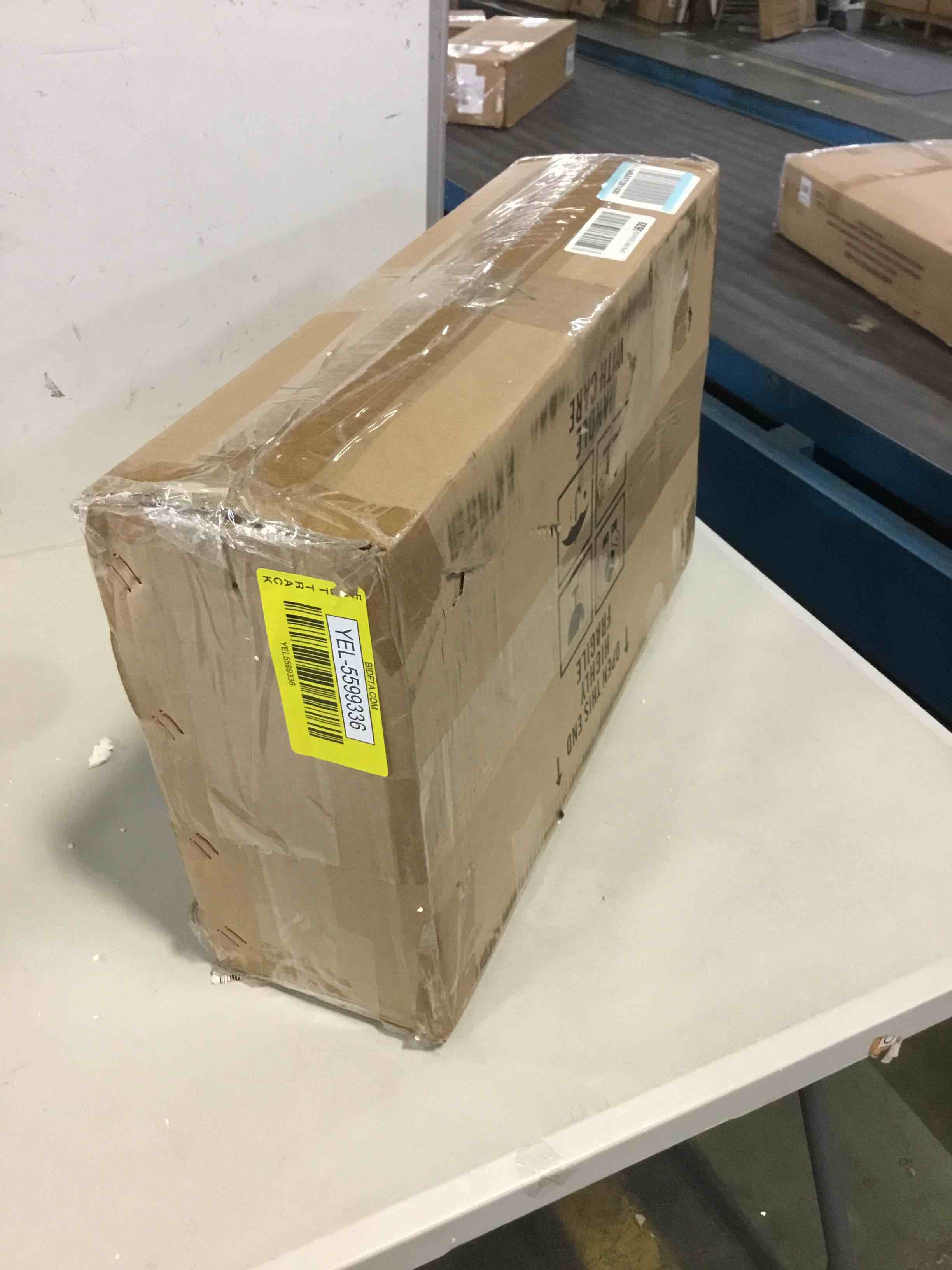 https://s3.amazonaws.com/lotting-images-prod/bidfta/YEL5599336_1697470684014.jpeg
