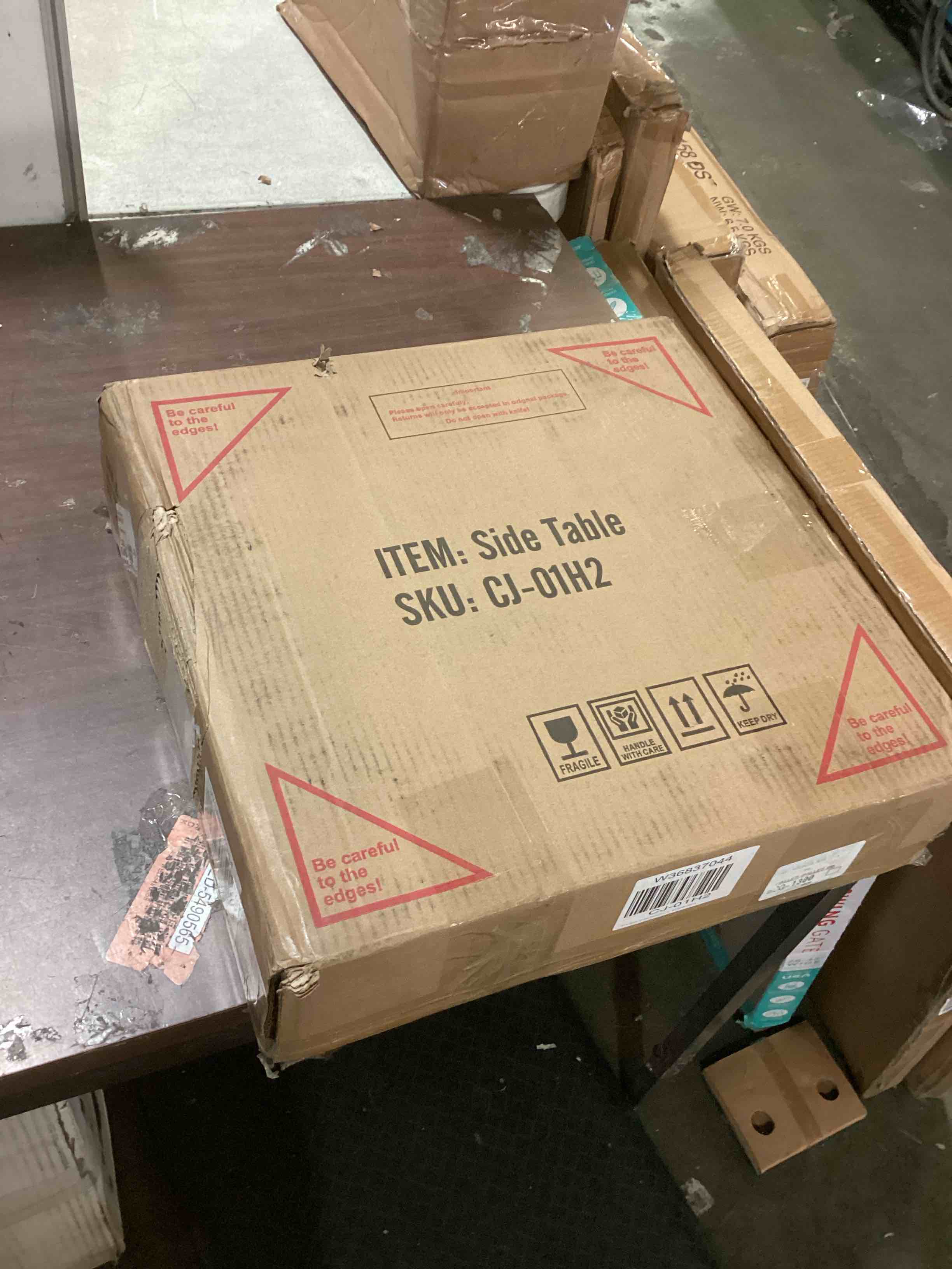 Lamerge Round End Side Table.