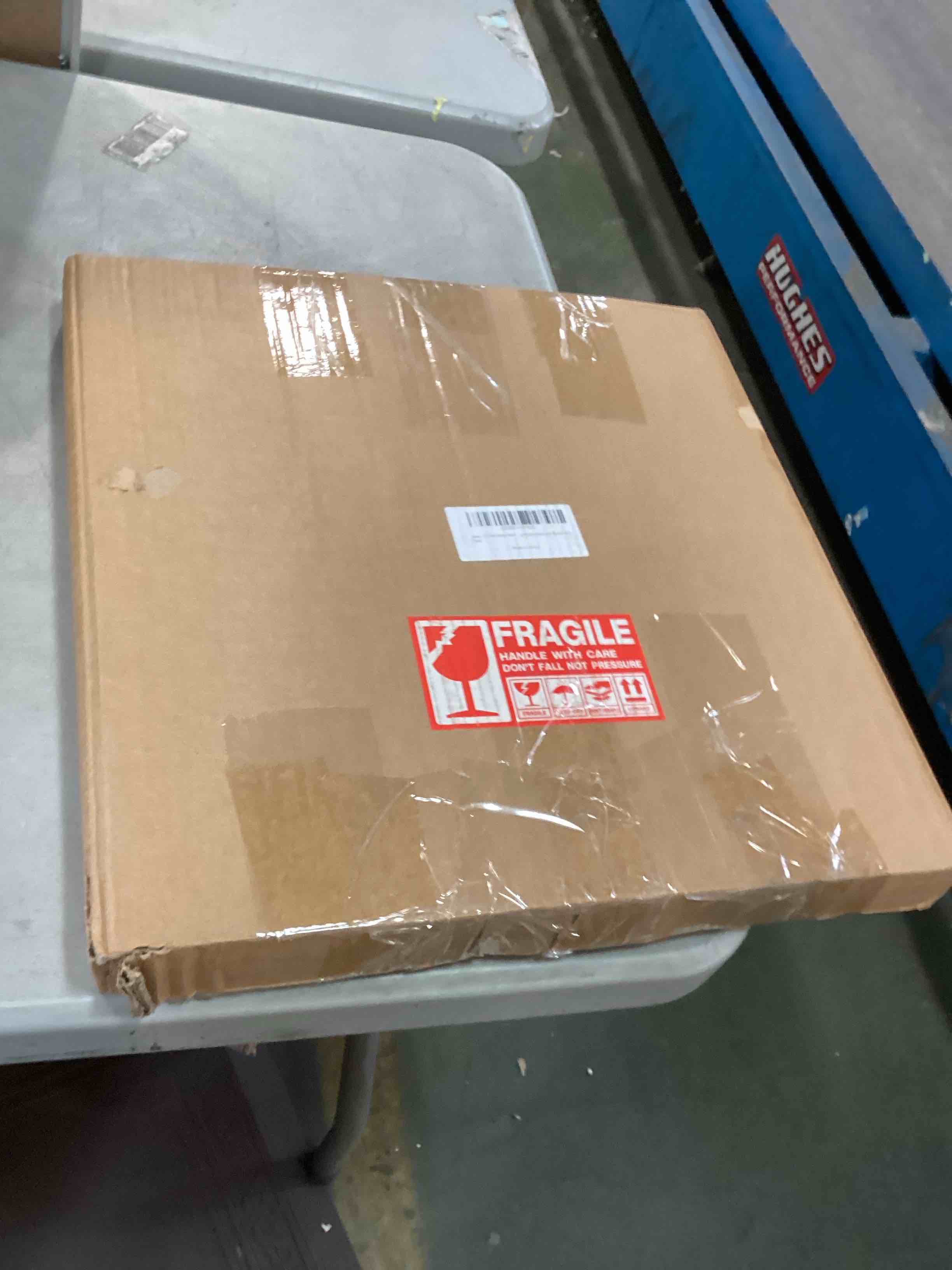 https://s3.amazonaws.com/lotting-images-prod/bidfta/YEL5684768_1707836004336.jpeg