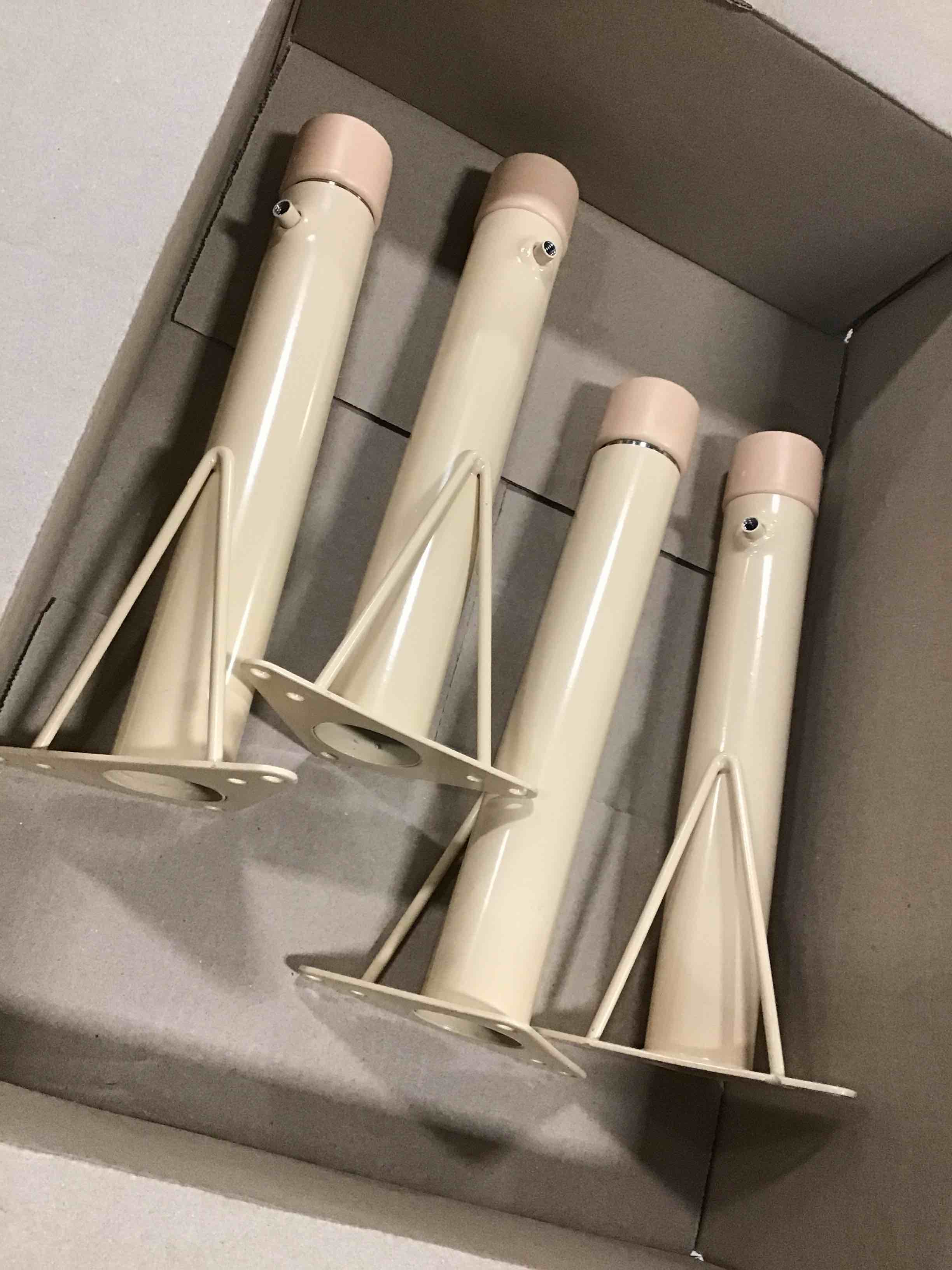 Cream-colored adjustable metal legs
