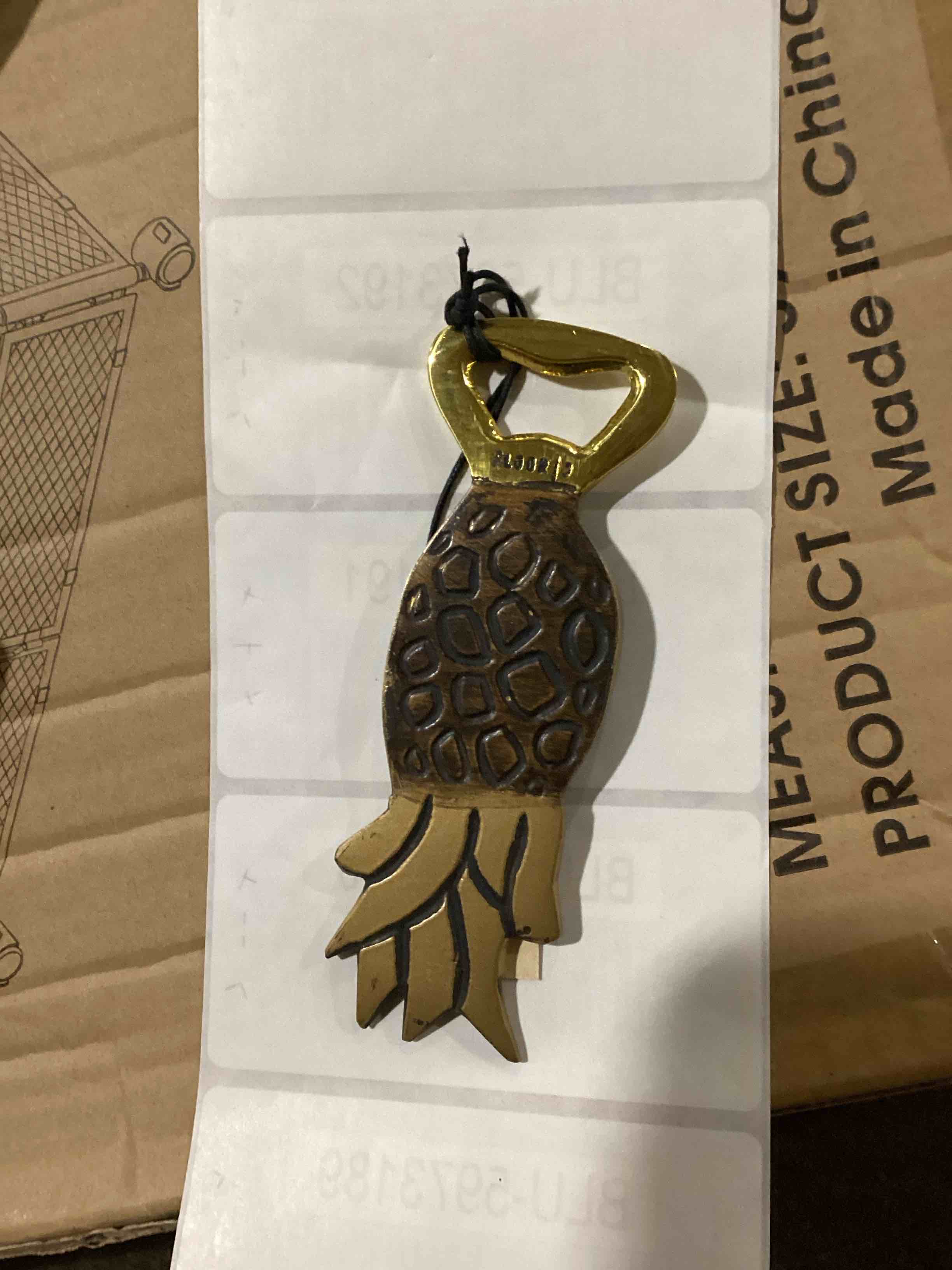  Floor 9 Pineapple shaped bottle opener similar to picture 