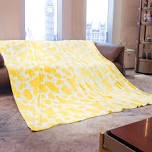 large yellow and white blanket 