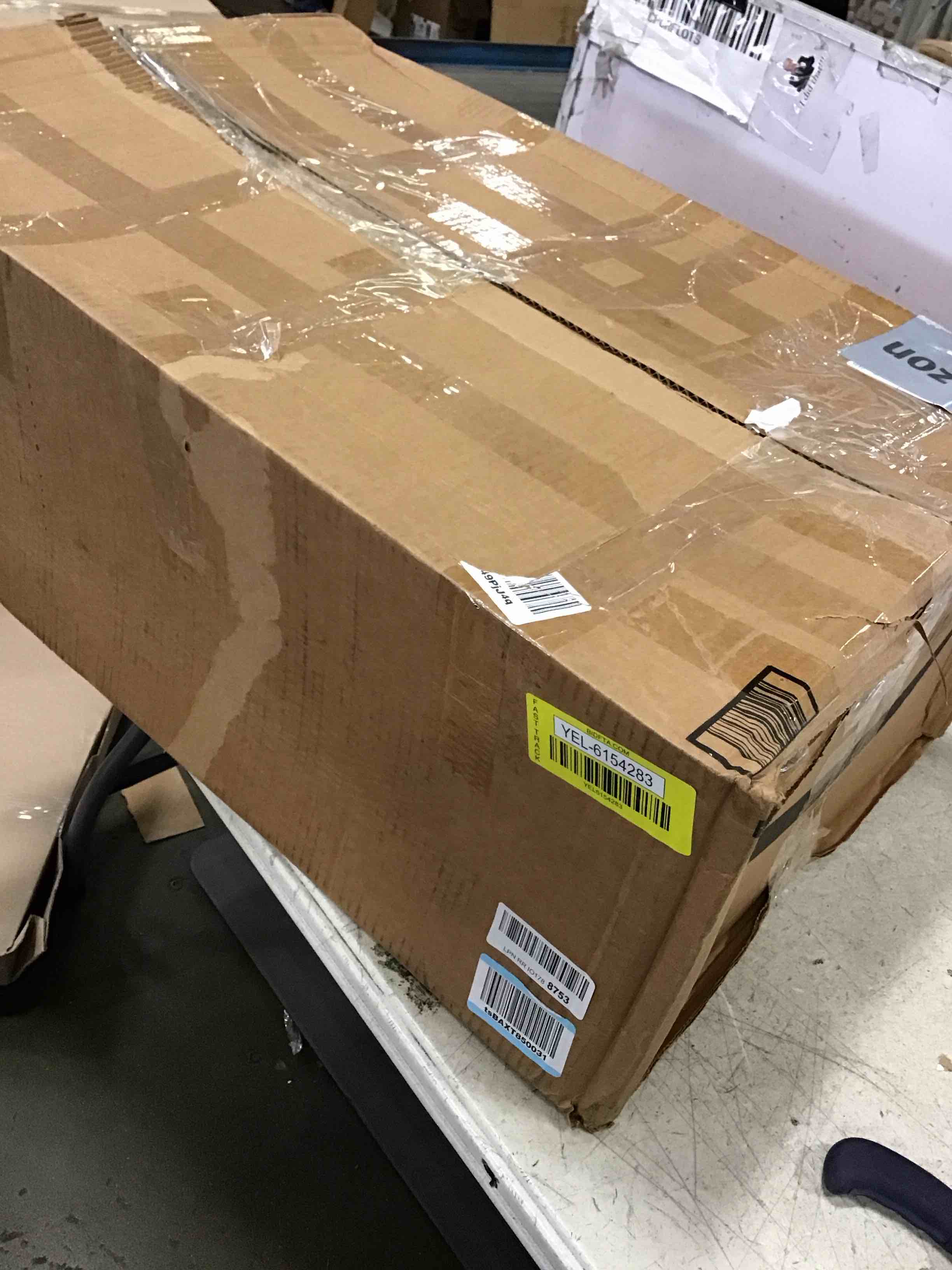 https://s3.amazonaws.com/lotting-images-prod/bidfta/YEL6154283_1715604840033.jpeg