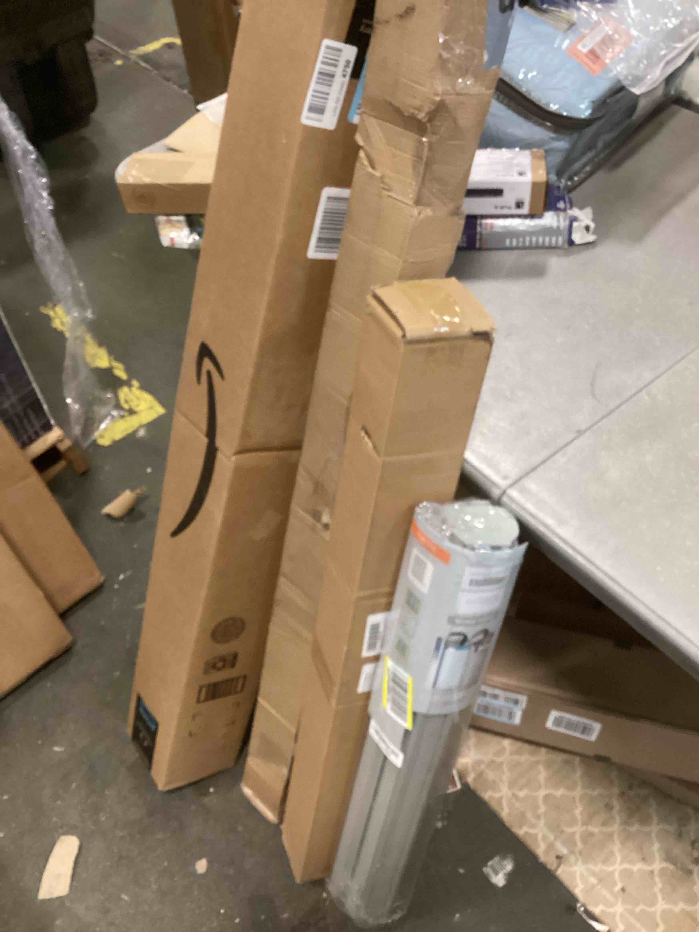 Assortment of Miscellaneous products (May Include cordless shade, curtain rods, retractable baby gate, Led universal linear lamp and more or other use)