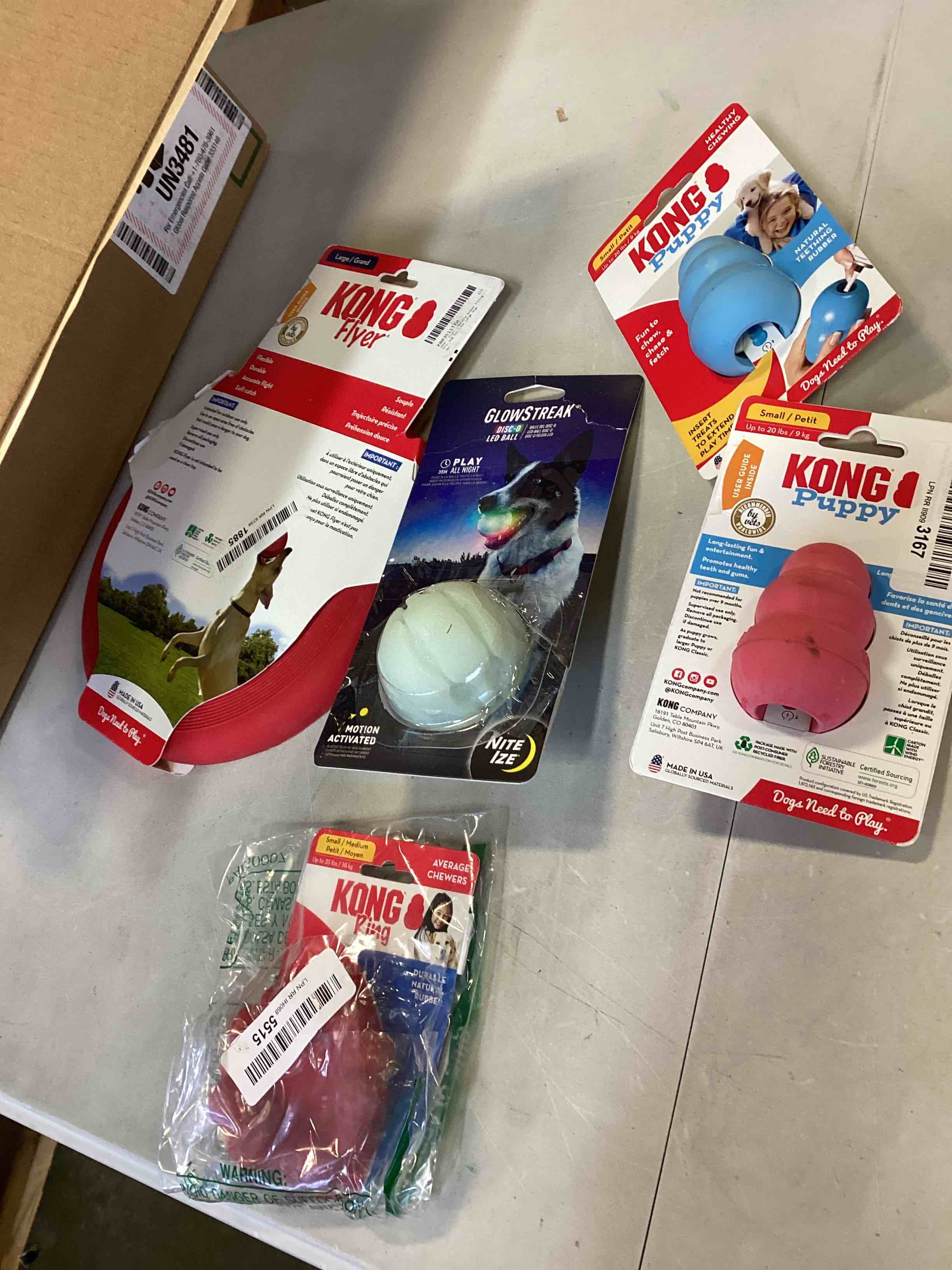 Assorted Kong dog toys Kong flyer,Kong puppy small blue, Kong puppy small pink, Kong ring , glow streak ball and more