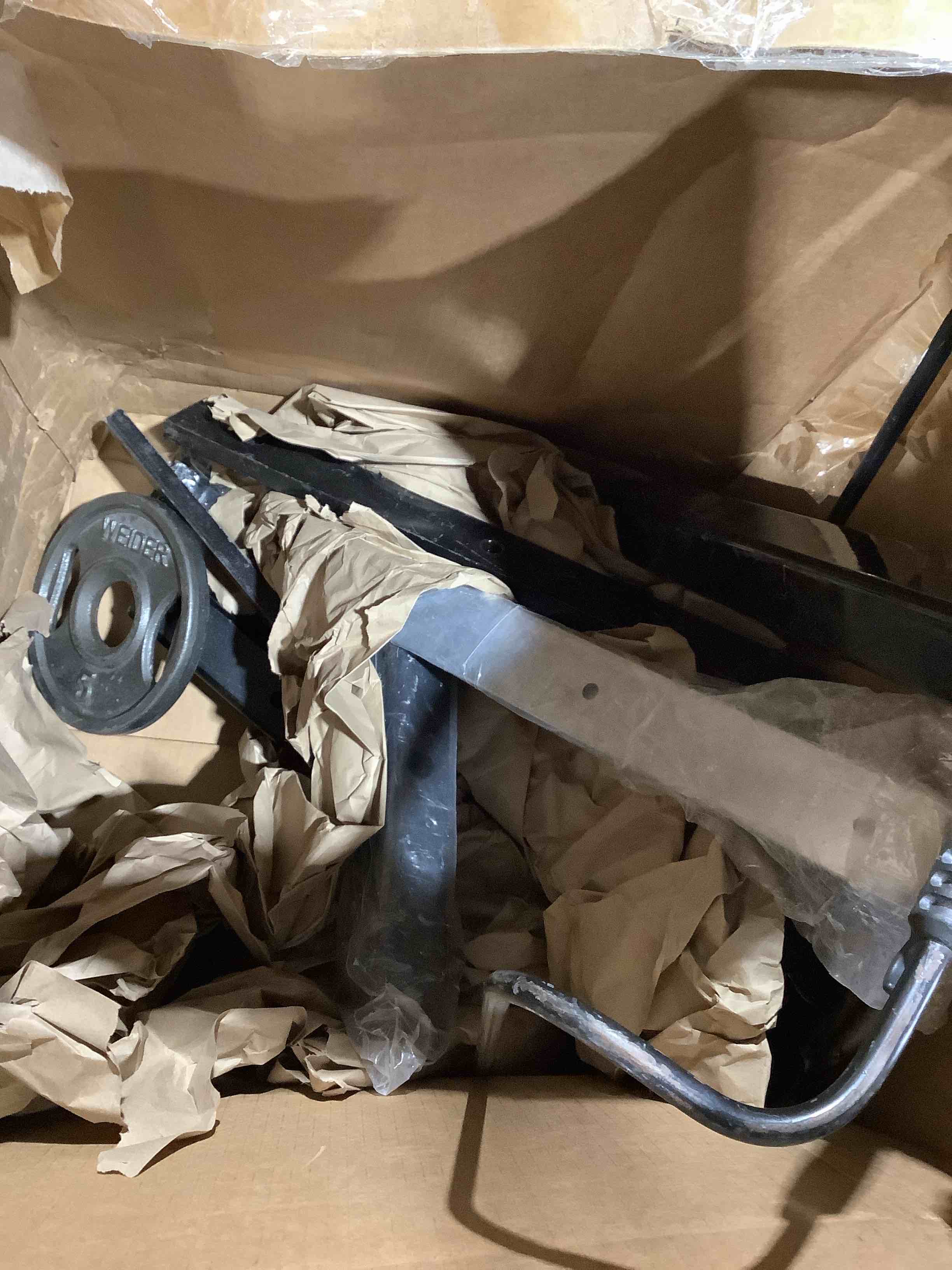 Assortment of Weider weights and accessories