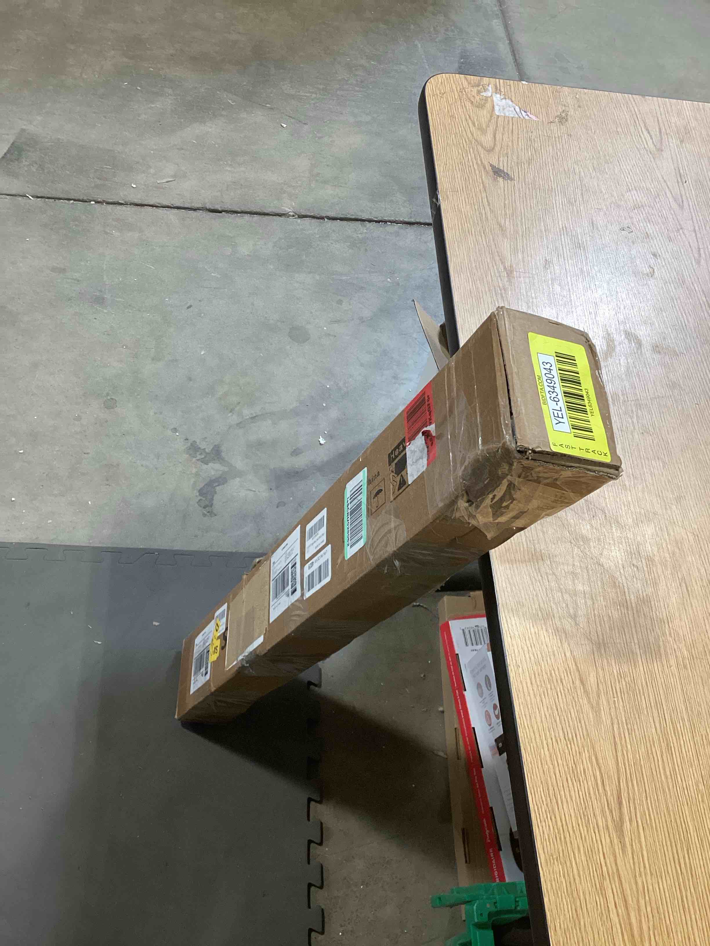 https://s3.amazonaws.com/lotting-images-prod/bidfta/YEL6349043_1717176136923.jpeg