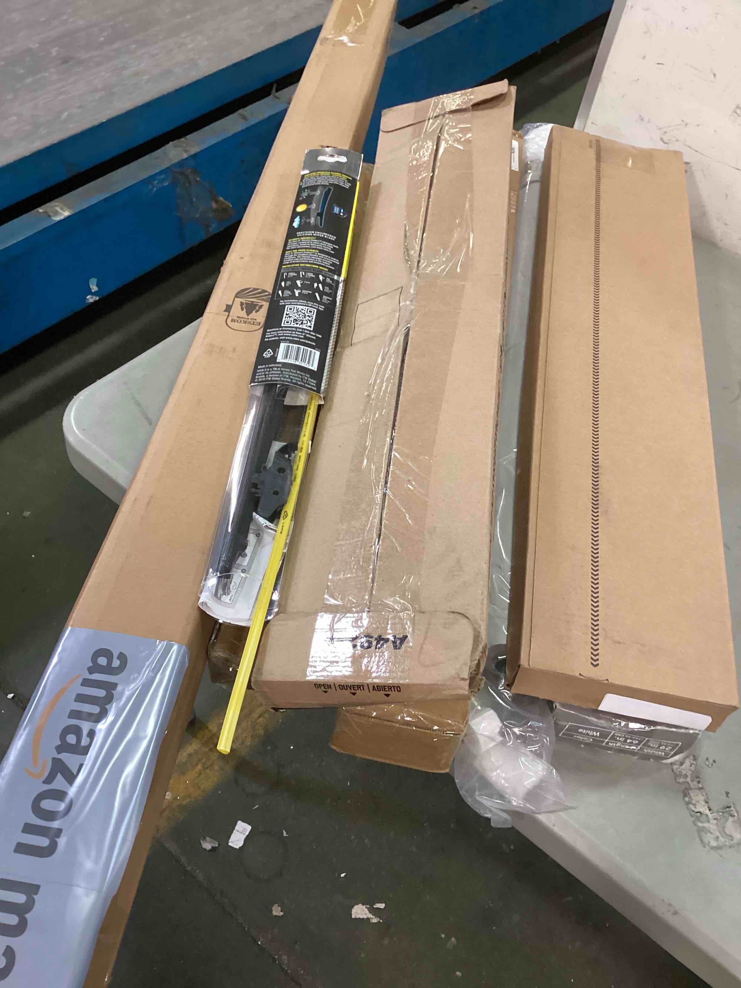 Various assorted items for home maintenance and car accessories