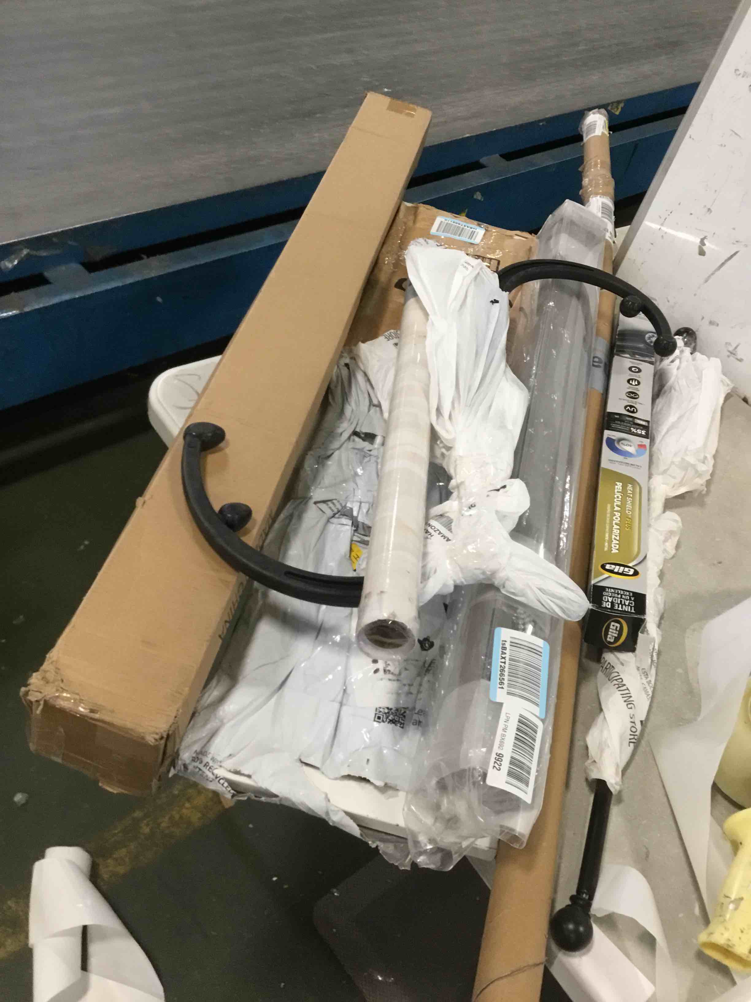 Various assorted items for home maintenance and car accessories