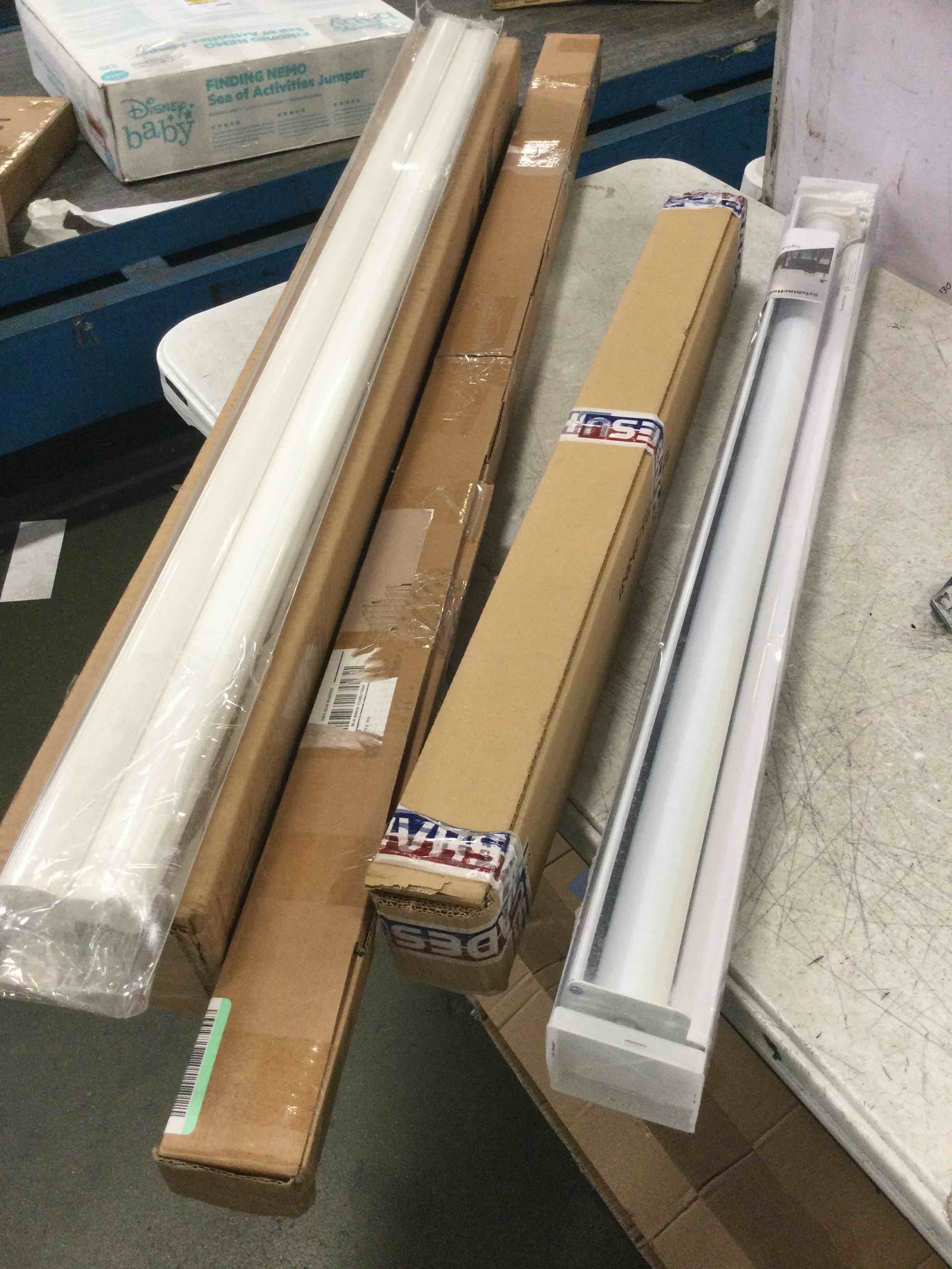 Assortment of Miscellaneous products (May Include cordless shade, curtain rods, retractable baby gate, Led universal linear lamp and more or other use)